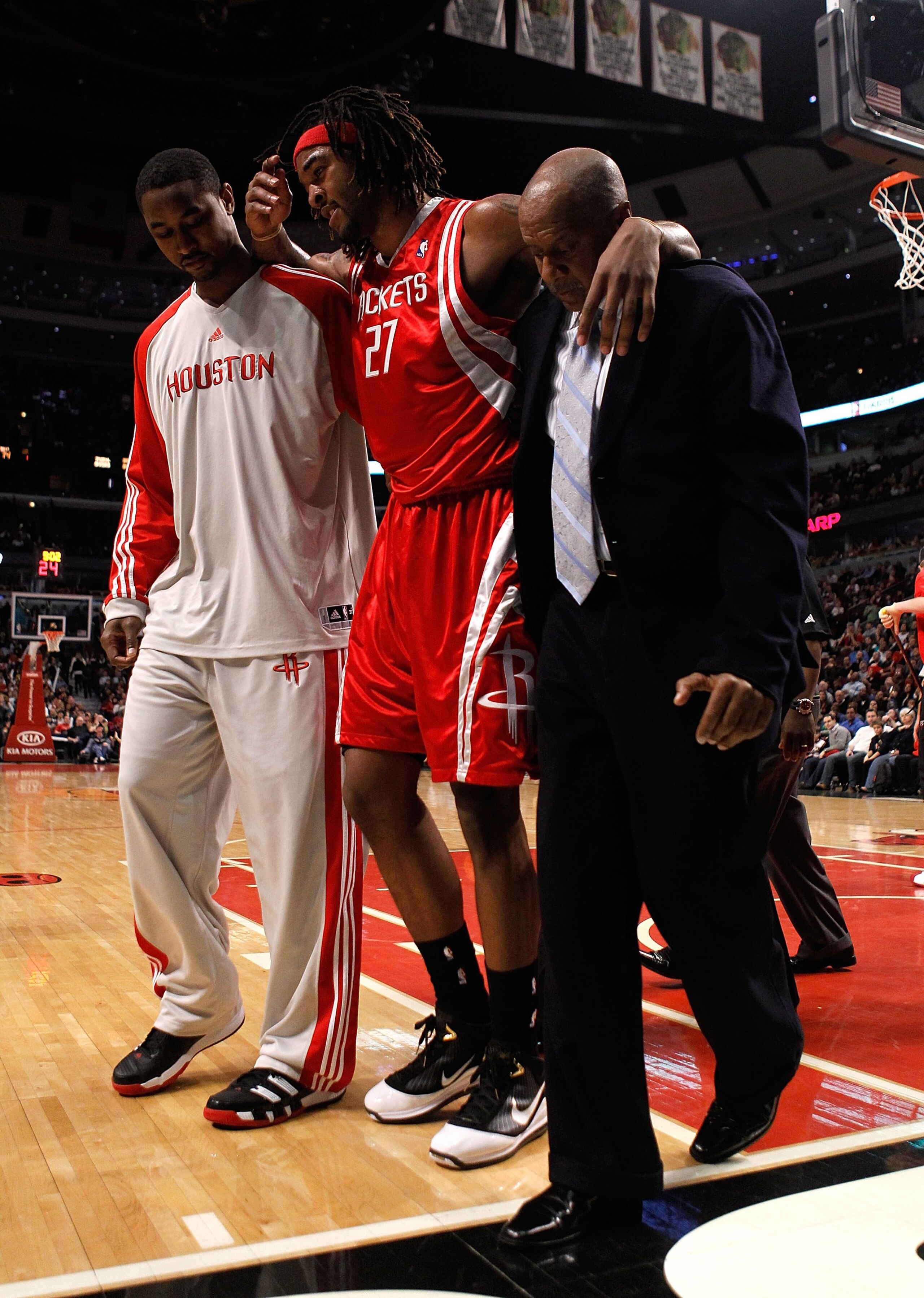 CHICAGO - MARCH 22: Jordan Hill #27 of the Houston Rockets is helped off the court after injuring his leg against the Chicago Bulls at the United Center on March 22, 2010 in Chicago, Illinois. The Bulls defeated the Rockets 98-88. NOTE TO USER: User expre