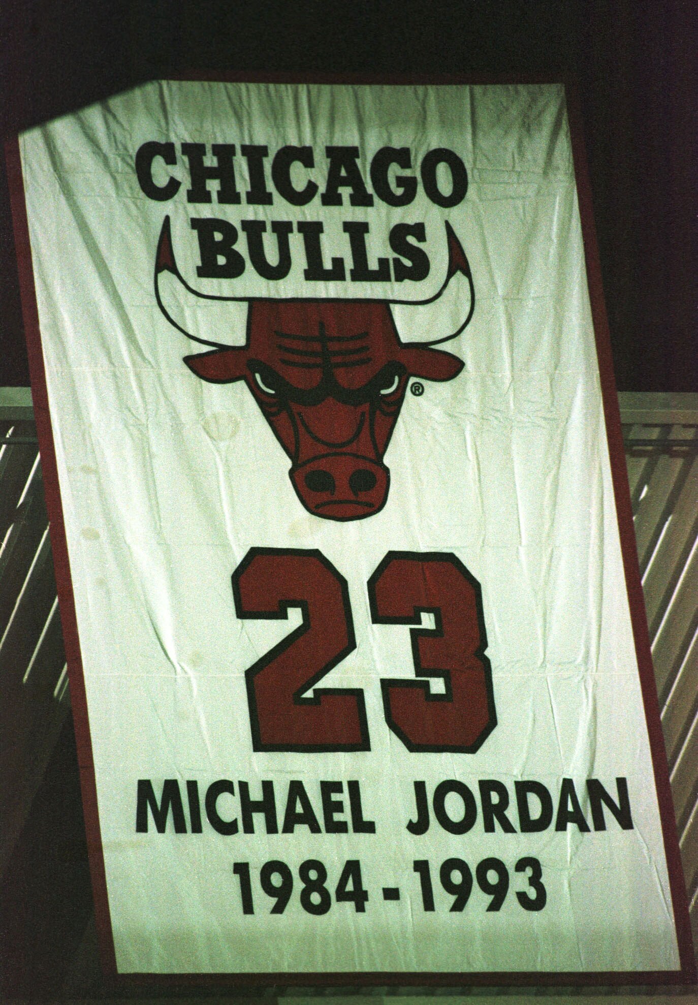 13 Jan 1999: A banner with Jordan''s jersey number 23 is raised after Michael Jordan of the Chicago Bulls announces his retirement from the NBA during a press conference at the United Center in Chicago, Illinois. The banner had first been raised after Jor