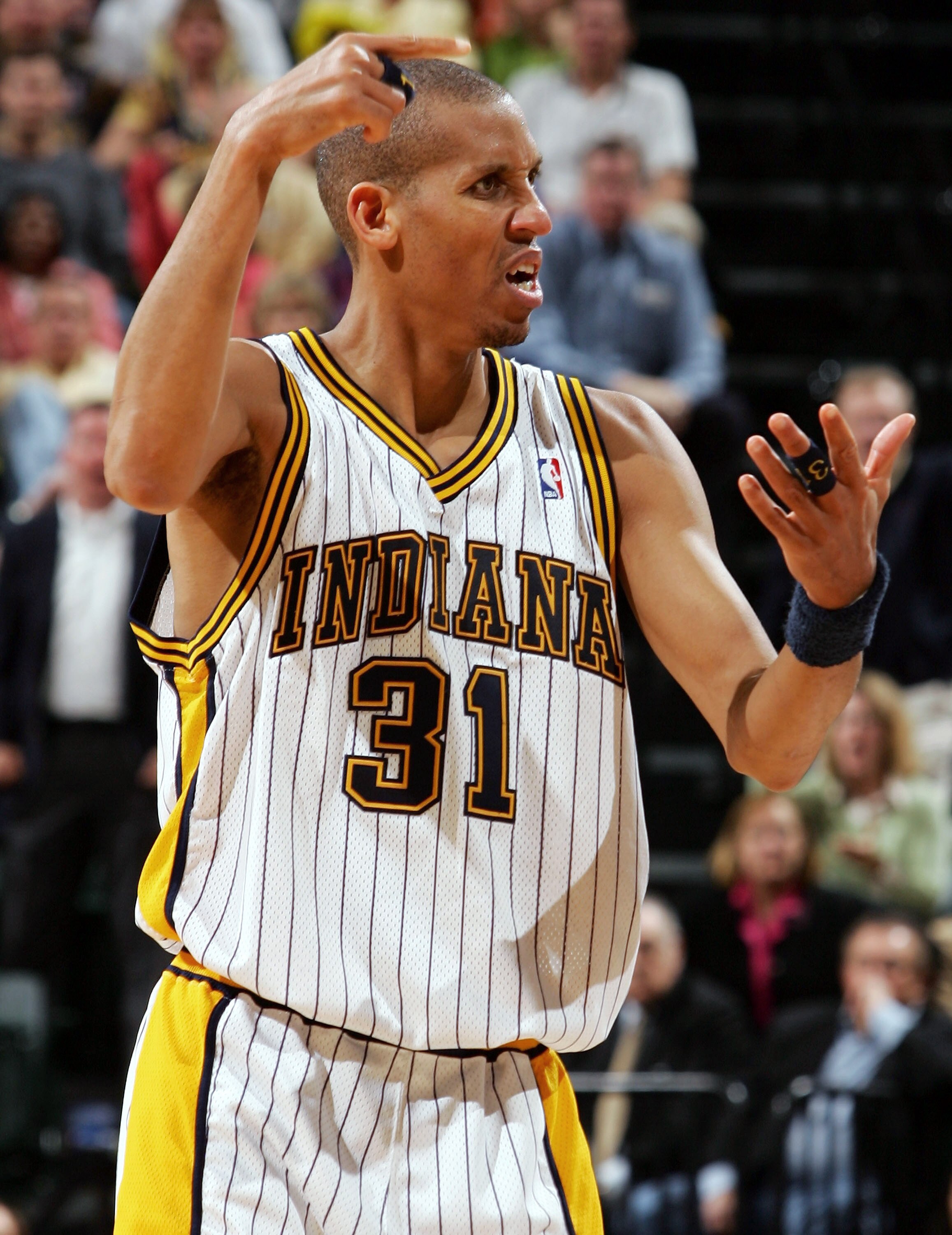 INDIANAPOLIS - MAY 15:  Reggie Miller #31 of the Indiana Pacers reacts to a call in Game four of the Eastern Conference Semifinals during the 2005 NBA Playoffs on May 15, 2005 at Conseco Fieldhouse in Indianapolis,Indiana. Richard Hamilton of the Pistons