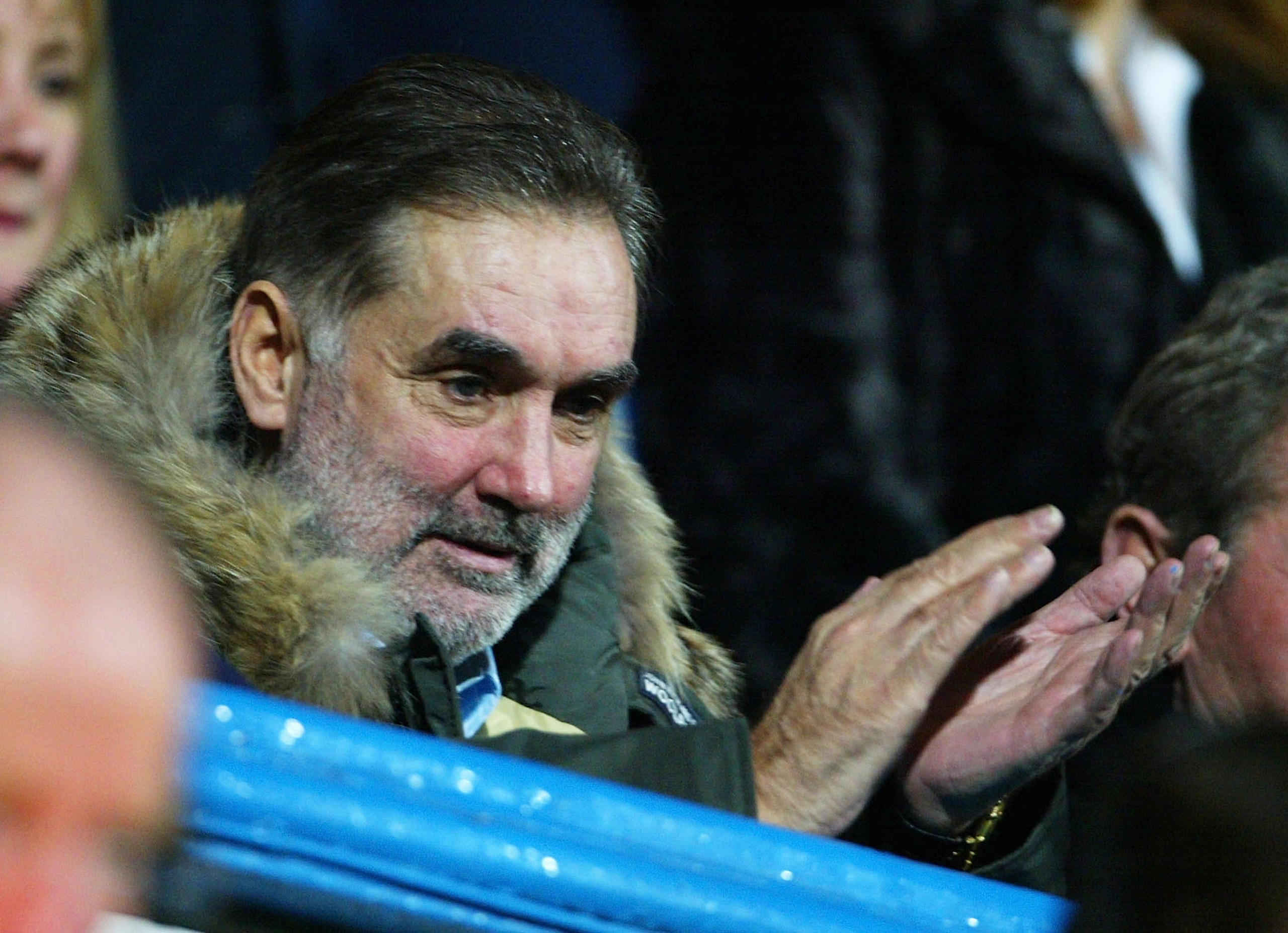 PORTSMOUTH, ENGLAND - FEBRUARY 11:  Ex-football player George Best watches the game during the FA Barclaycard Premiership match between Portsmouth and Chelsea at Fratton Park on February 11, 2004 in Portsmouth, England.  (Photo by Phil Cole/Getty Images)