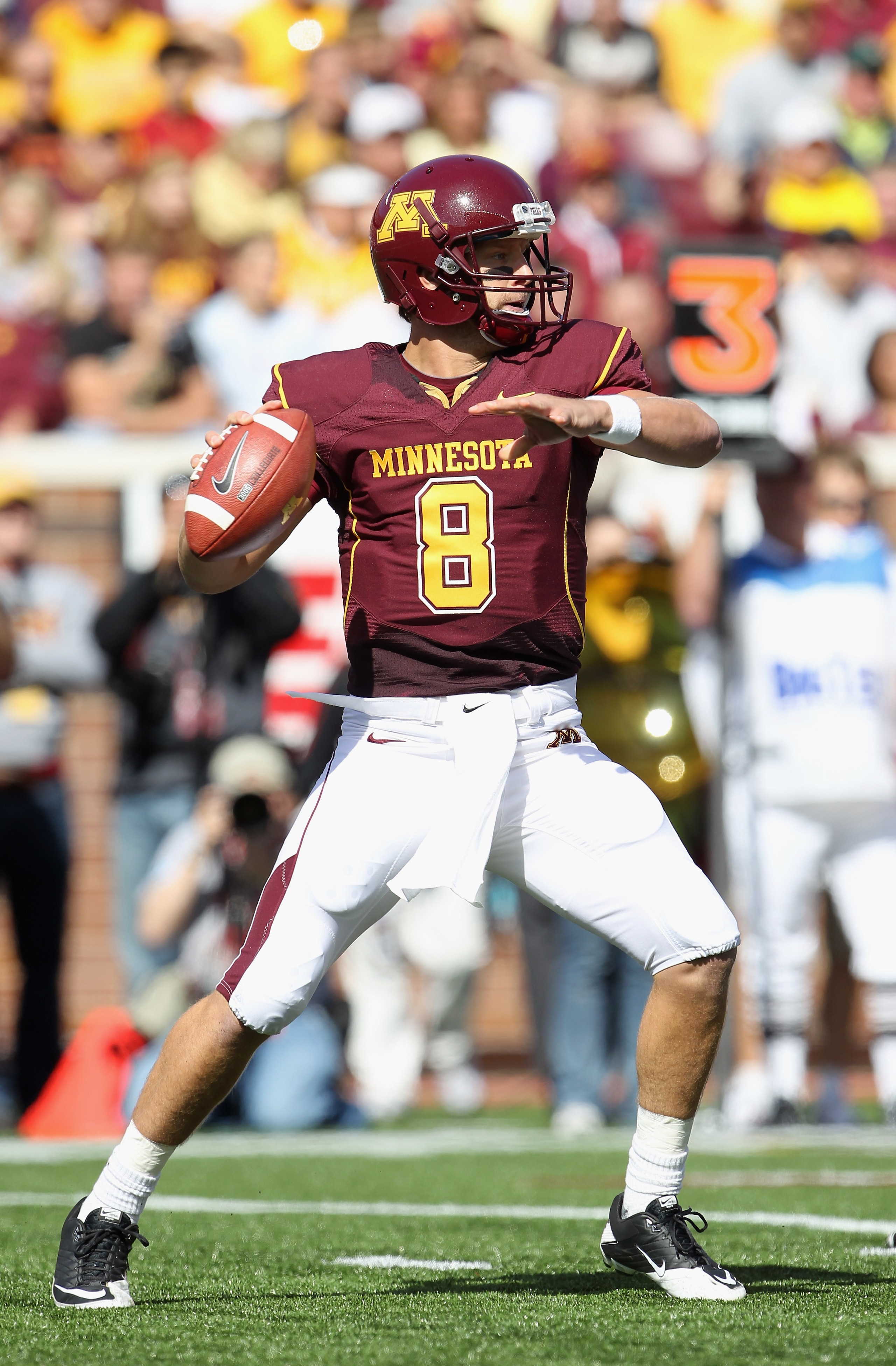 MINNEAPOLIS - SEPTEMBER 18: Quarterback Adam Weber #8 of the Minnesota Golden Gophers passes during the game against the USC Trojans on September 18, 2010 at TCF Bank Stadium in Minneapolis, Minnesota. (Photo by Jamie Squire/Getty Images) MINNEAPOLIS - SEPTEMBER 18: Quarterback Adam Weber #8 of the Minnesota Golden Gophers passes during the game against the USC Trojans on September 18, 2010 at TCF Bank Stadium in Minneapolis, Minnesota. (Photo by Jamie Squire/Getty Images)