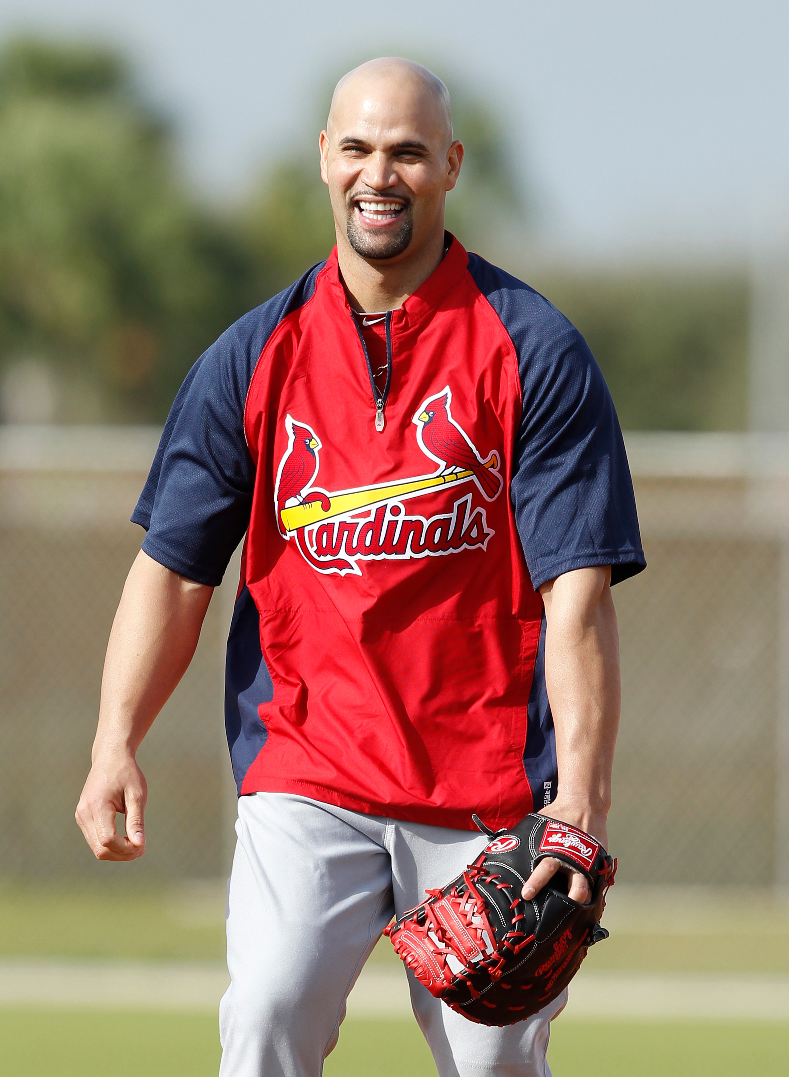 JUPITER, FL - FEBRUARY 17: Albert Pujols #5 of the St. Louis Cardinals reacts to a comment by a teammate during fielding practice at Roger Dean Stadium on February 17, 2011 in Jupiter, Florida. (Photo by Joel Auerbach/Getty Images)