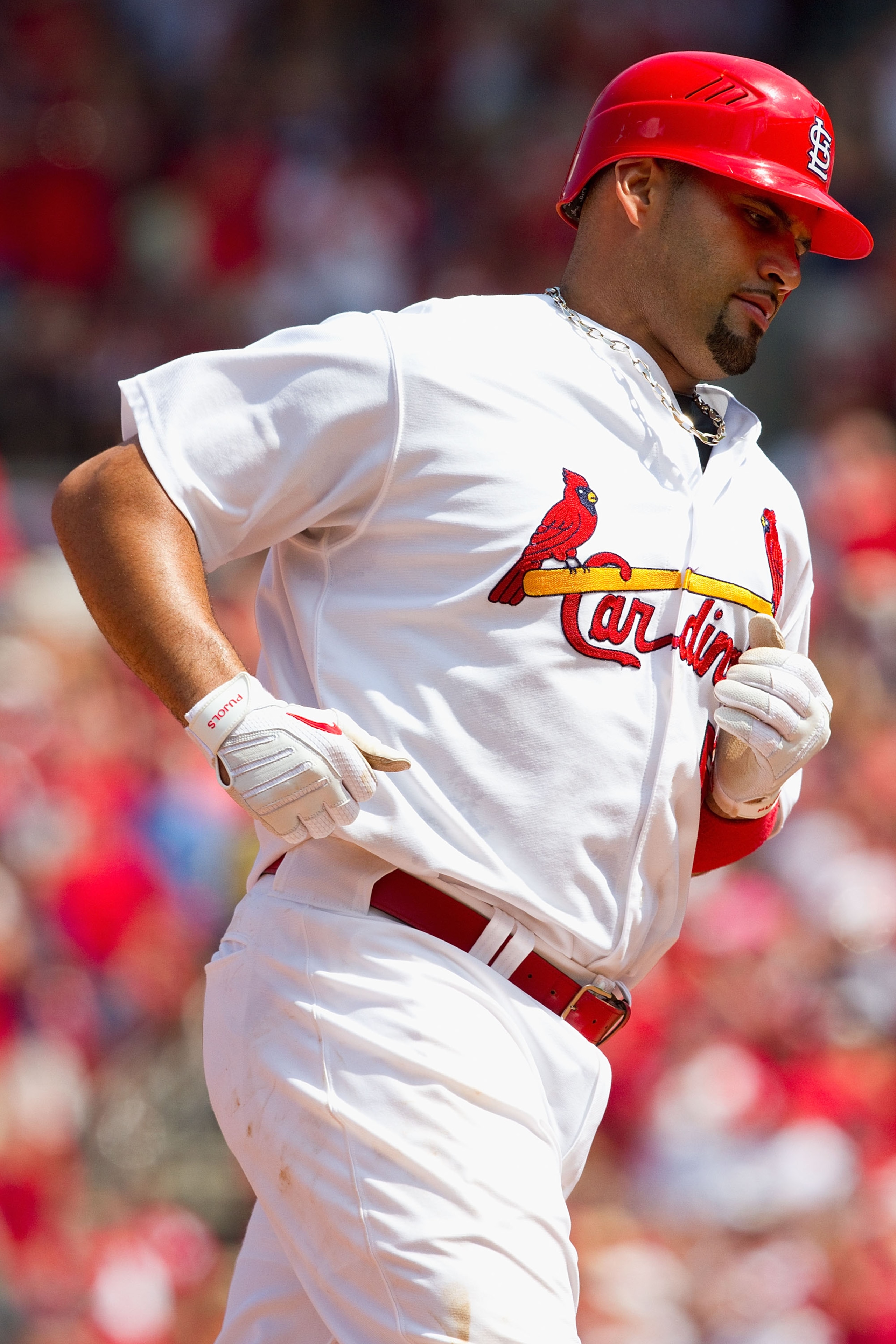 ST. LOUIS - AUGUST 1: Albert Pujols #5 of the St. Louis Cardinals rounds the bases after hitting a two-run home run against the Pittsburgh Pirates at Busch Stadium on August 1, 2010 in St. Louis, Missouri.  The Cardinals beat the Pirates 9-1.  (Photo by D