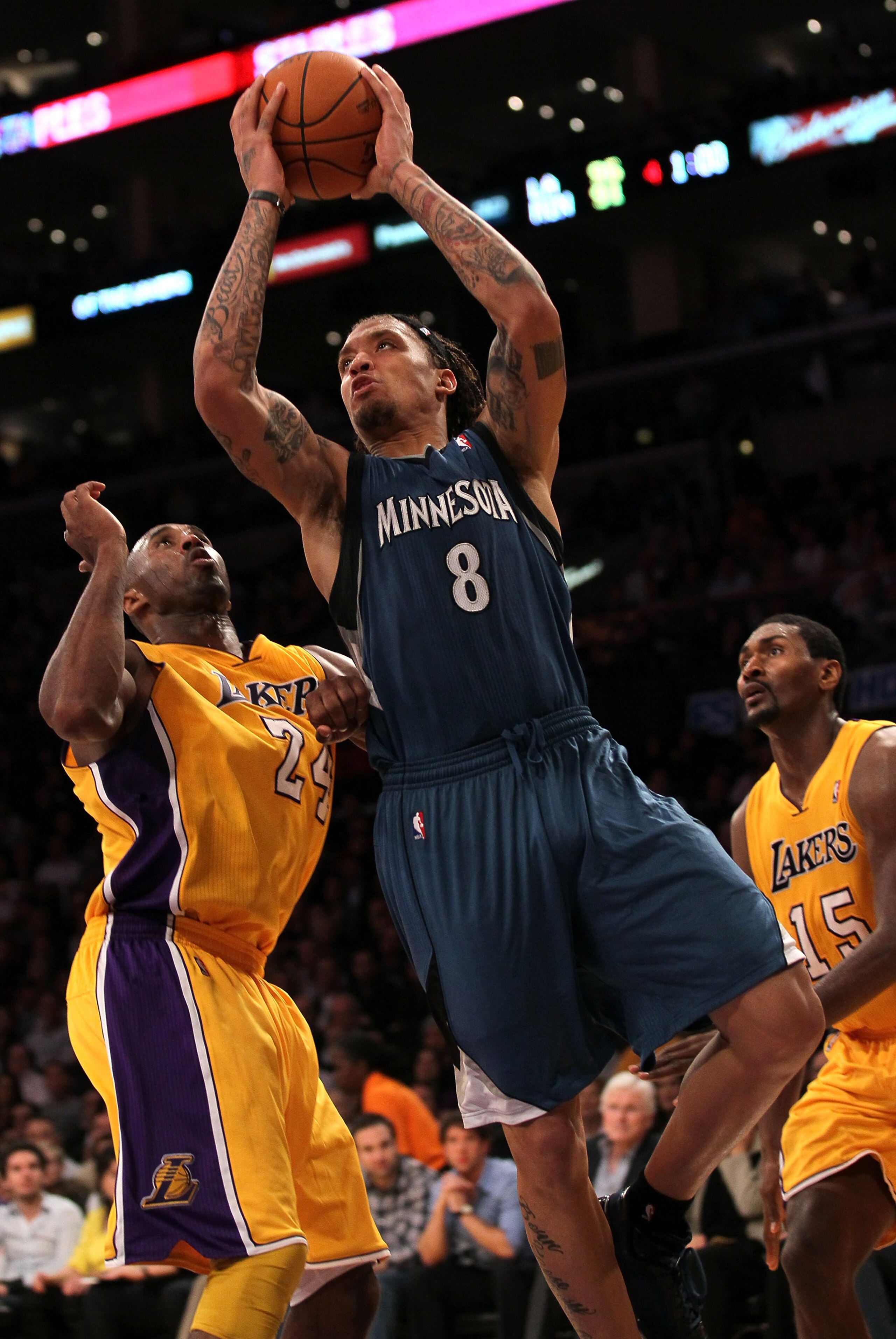 LOS ANGELES, CA - NOVEMBER 09: Michael Beasley #8 of the Minnesota Timberwolves goes up for a shot over Kobe Bryant #24 of the Los Angeles Lakers at Staples Center on November 9, 2010 in Los Angeles, California. The Lakers won 99-94. NOTE TO USER: User LOS ANGELES, CA - NOVEMBER 09: Michael Beasley #8 of the Minnesota Timberwolves goes up for a shot over Kobe Bryant #24 of the Los Angeles Lakers at Staples Center on November 9, 2010 in Los Angeles, California. The Lakers won 99-94. NOTE TO USER: User