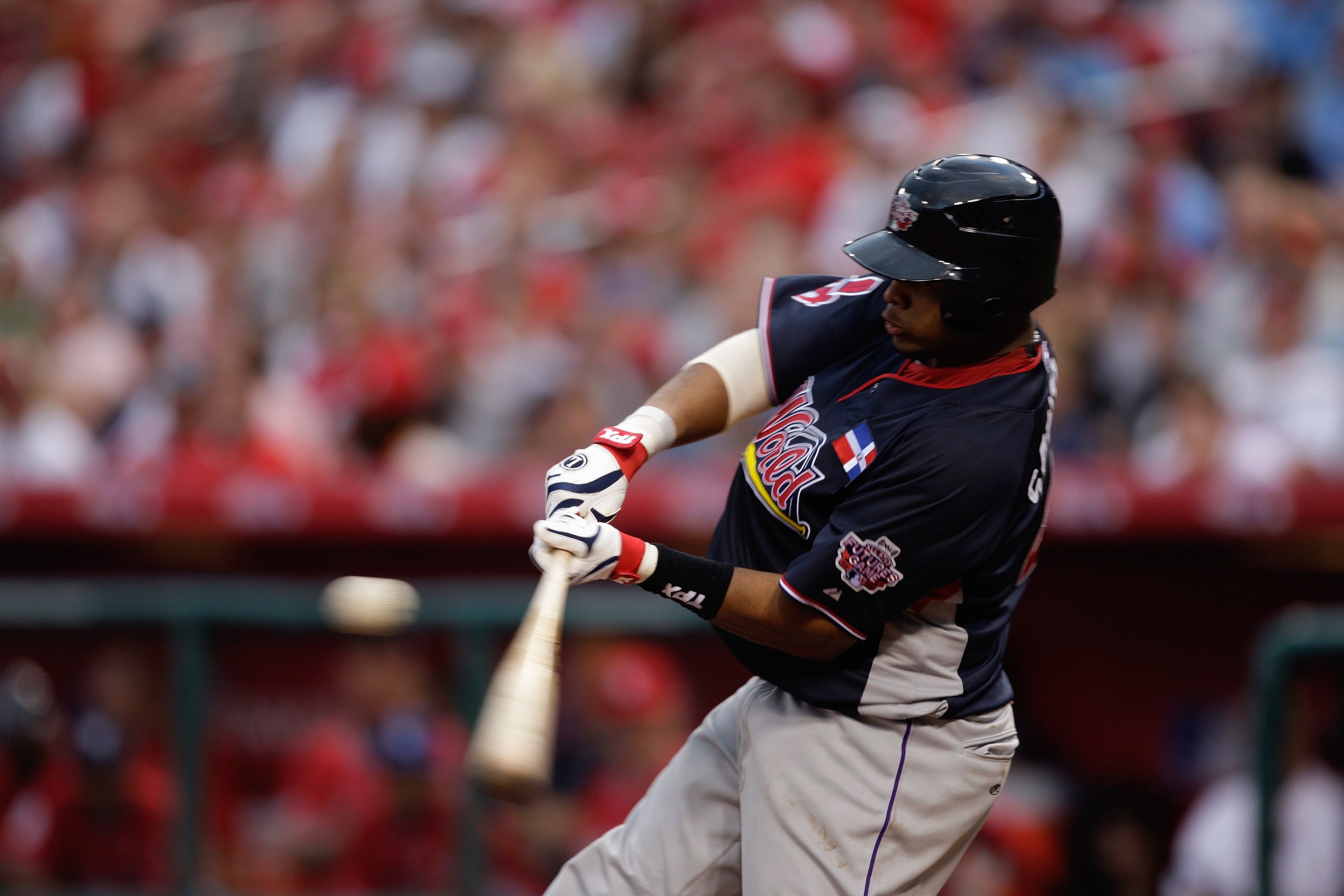 ST. LOUIS, MO - JULY 12:  World Futures All-Star Carlos Santana of the Cleveland Indians bats during the 2009 XM All-Star Futures Game at Busch Stadium on July 12, 2009 in St. Louis, Missouri. (Photo by Jamie Squire/Getty Images)