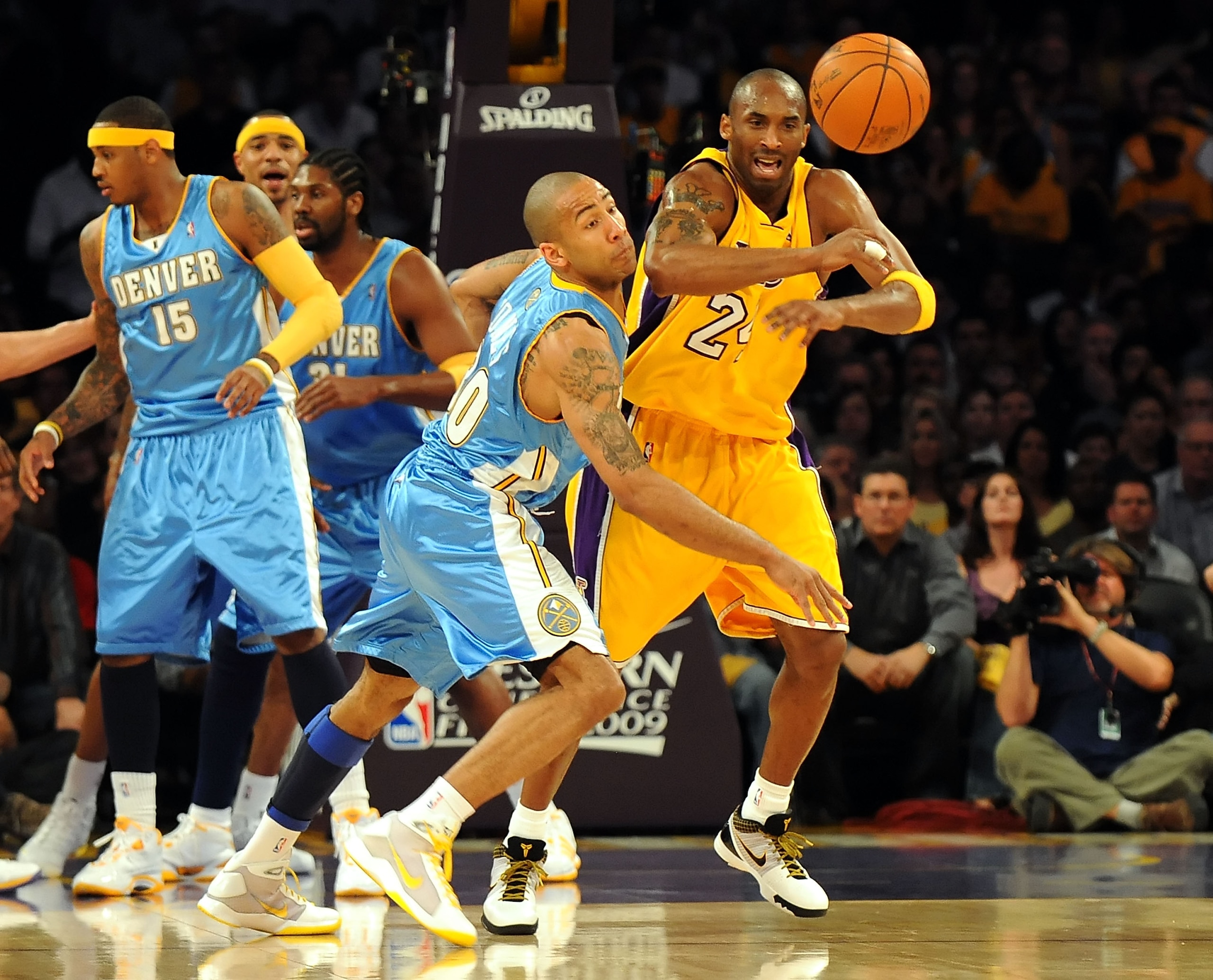 LOS ANGELES, CA - MAY 27: Dahntay Jones #30 of the Denver Nuggets steals the ball from Kobe Bryant #24 of the Los Angeles Lakers in the first quarter of Game Five of the Western Conference Finals during the 2009 NBA Playoffs at Staples Center on May 27, LOS ANGELES, CA - MAY 27: Dahntay Jones #30 of the Denver Nuggets steals the ball from Kobe Bryant #24 of the Los Angeles Lakers in the first quarter of Game Five of the Western Conference Finals during the 2009 NBA Playoffs at Staples Center on May 27,