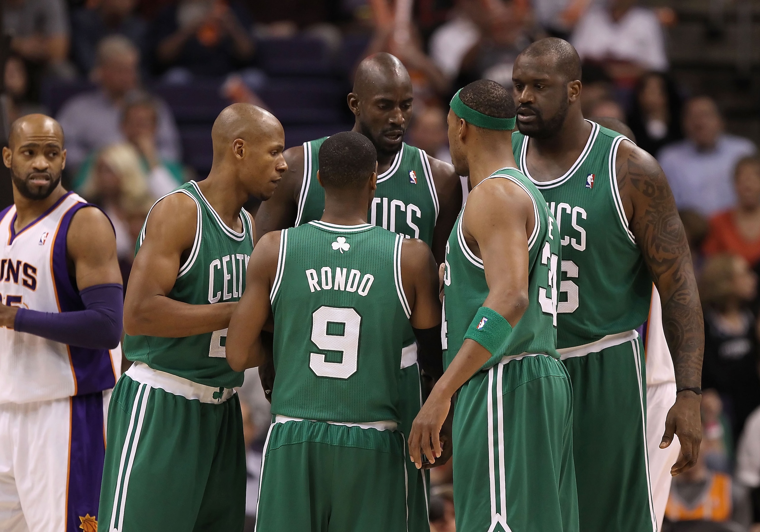 PHOENIX, AZ - JANUARY 28: (L-R) Ray Allen #20, Rajon Rondo #9, Kevin Garnett #5, Paul Pierce #34 and Shaquille O'Neal #36 of the Boston Celtics huddle up during the NBA game against the Phoenix Suns at US Airways Center on January 28, 2011 in Phoenix, Ar PHOENIX, AZ - JANUARY 28: (L-R) Ray Allen #20, Rajon Rondo #9, Kevin Garnett #5, Paul Pierce #34 and Shaquille O'Neal #36 of the Boston Celtics huddle up during the NBA game against the Phoenix Suns at US Airways Center on January 28, 2011 in Phoenix, Ar