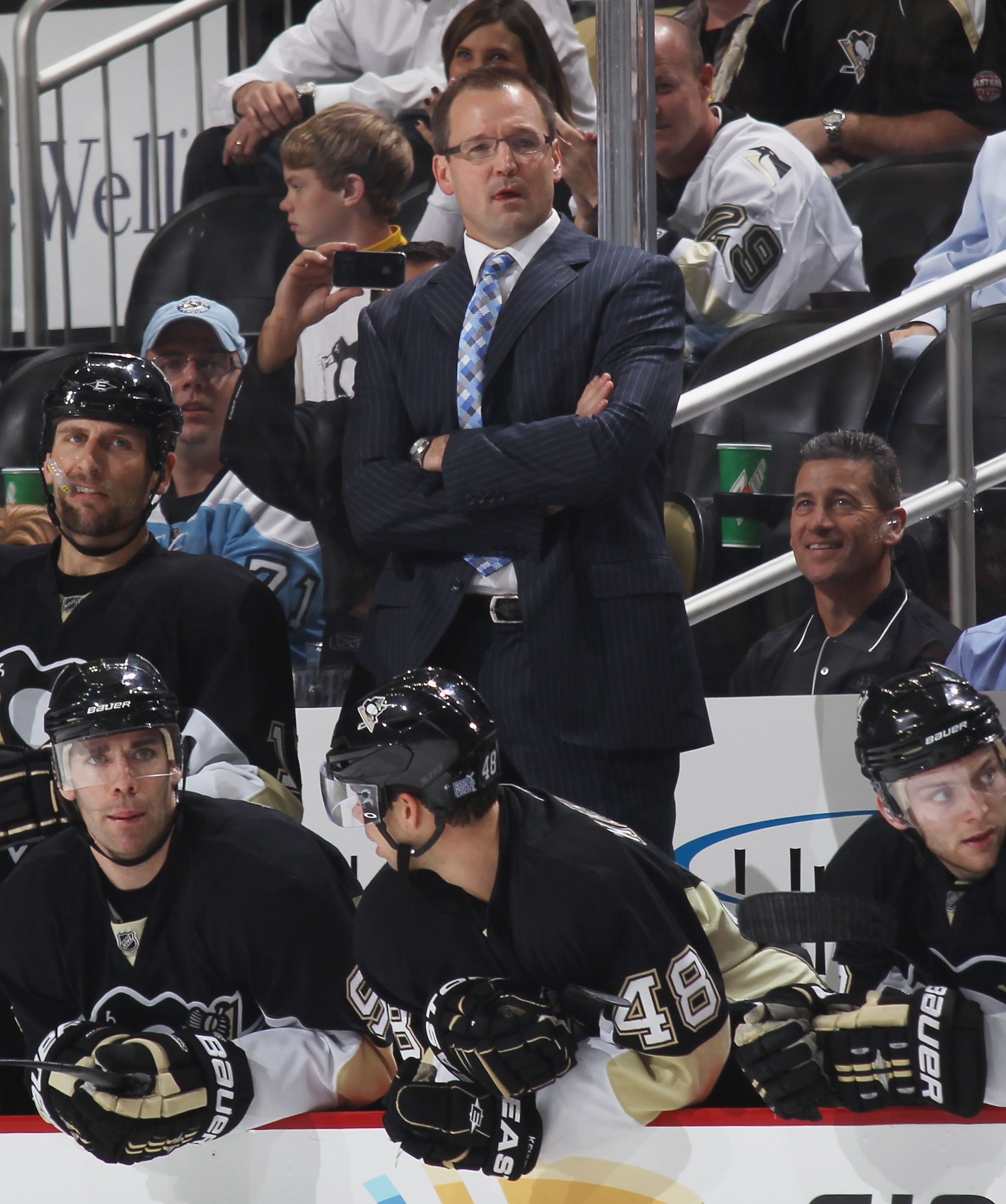 PITTSBURGH - OCTOBER 07: Coach Dan Bylsma of the Pittsburgh Penguins watches the action against the Philadelphia Flyers at the Consol Energy Center on October 7, 2010 in Pittsburgh, Pennsylvania.  (Photo by Bruce Bennett/Getty Images)