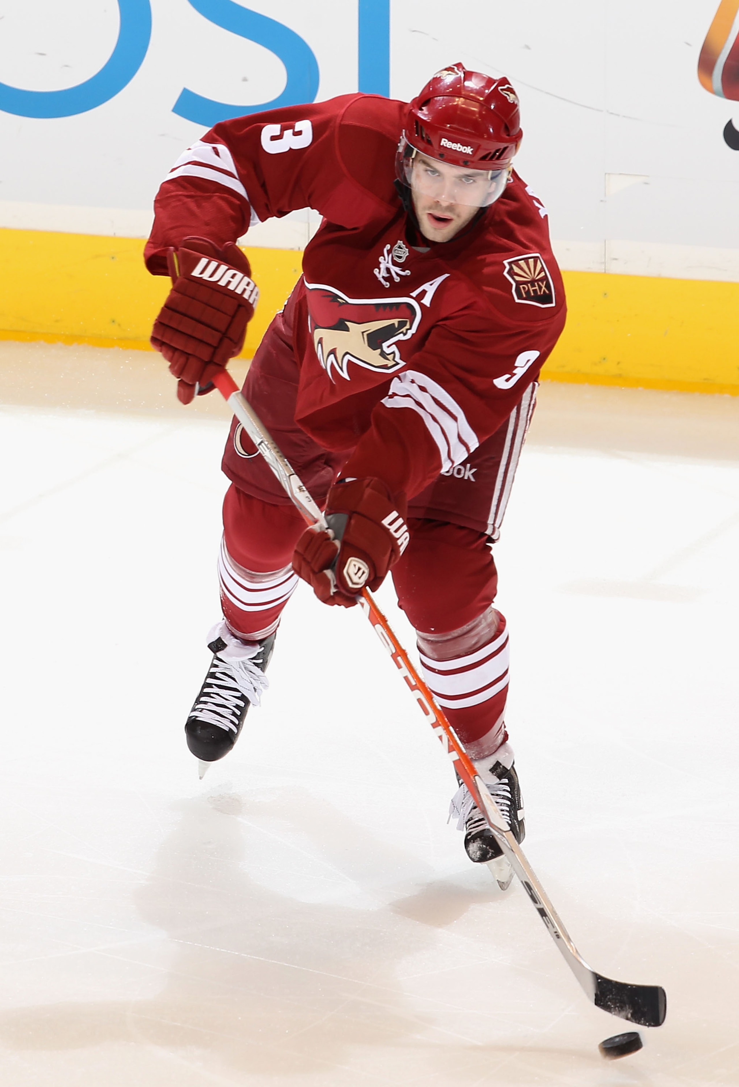 GLENDALE, AZ - JANUARY 15:  Keith Yandle #3 of the Phoenix Coyotes passes the puck during the NHL game against the Anaheim Ducks at Jobing.com Arena on January 15, 2011 in Glendale, Arizona.  The Coyotes defeated the Ducks 6-2.  (Photo by Christian Peters
