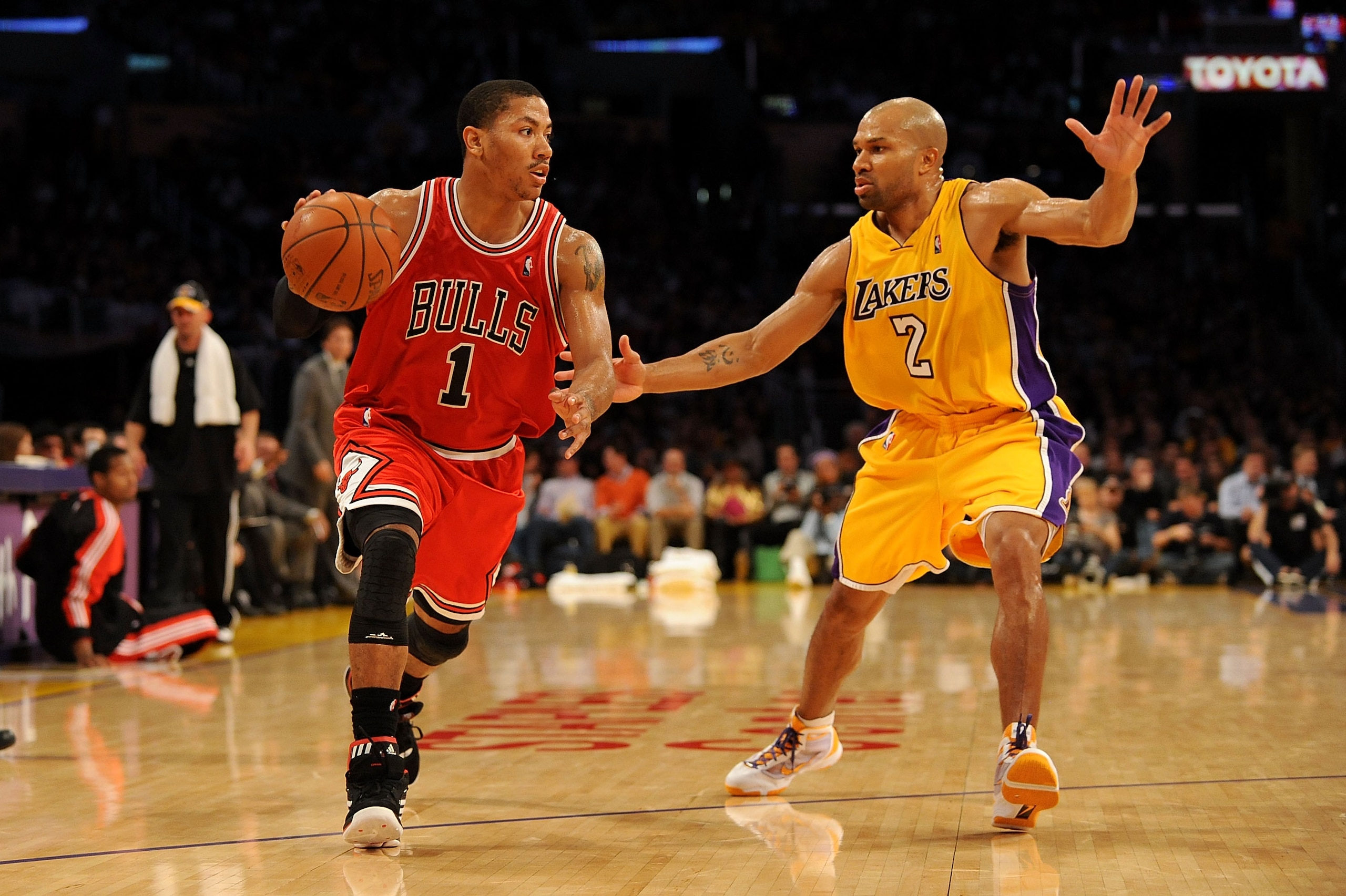LOS ANGELES, CA - NOVEMBER 19:  Derrick Rose #1 of the Chicago Bulls drives against Derek Fisher #2 of the Los Angeles Lakers during the game on November 19, 2009 at Staples Center in Los Angeles, California.  The Lakers won 108-93.   NOTE TO USER: User e