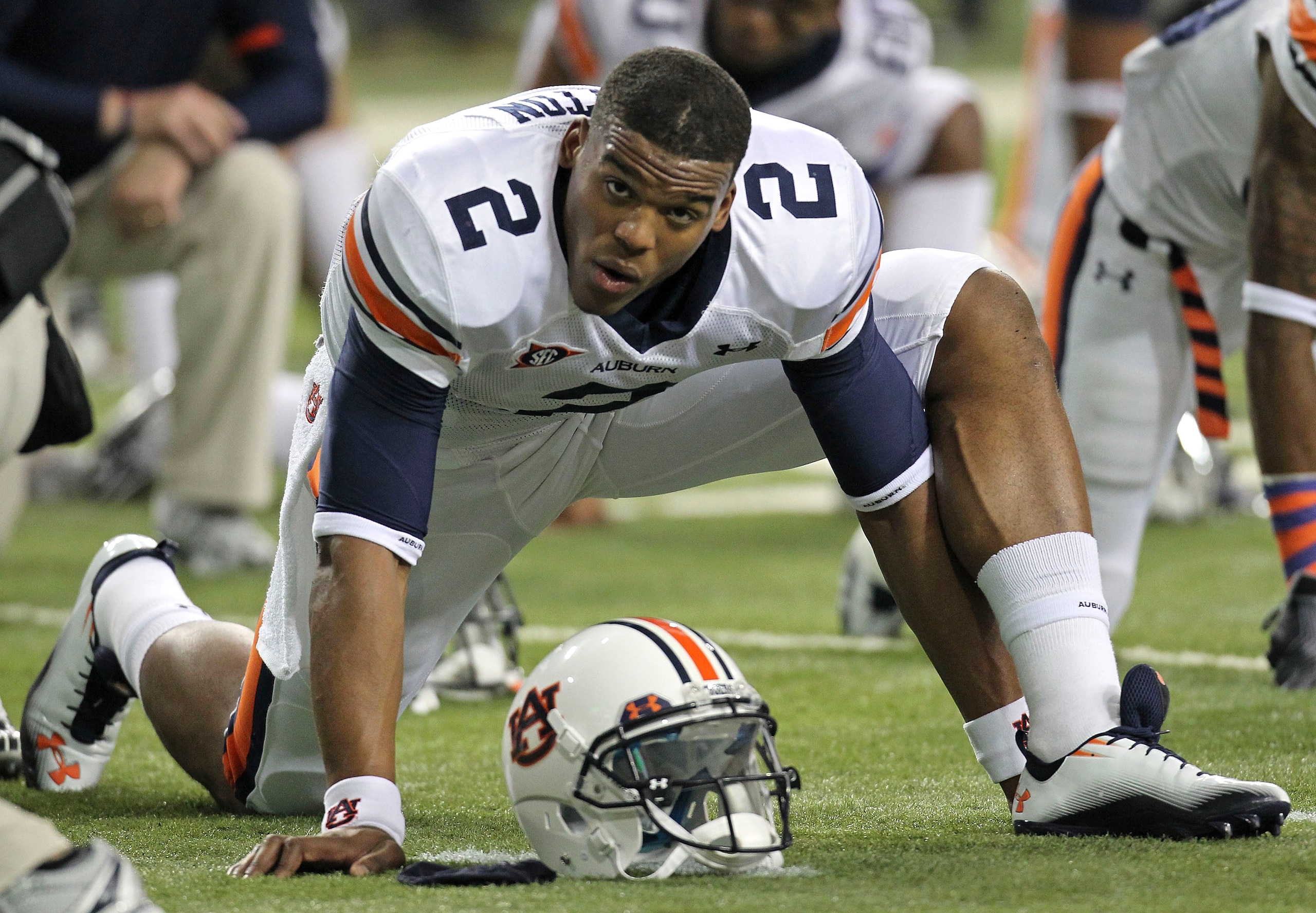 ATLANTA - DECEMBER 04:  Quarterback Cam Newton #2 of the Auburn Tigers stretches before the 2010 SEC Championship against the South Carolina Gamecocks at Georgia Dome on December 4, 2010 in Atlanta, Georgia.  (Photo by Mike Zarrilli/Getty Images)