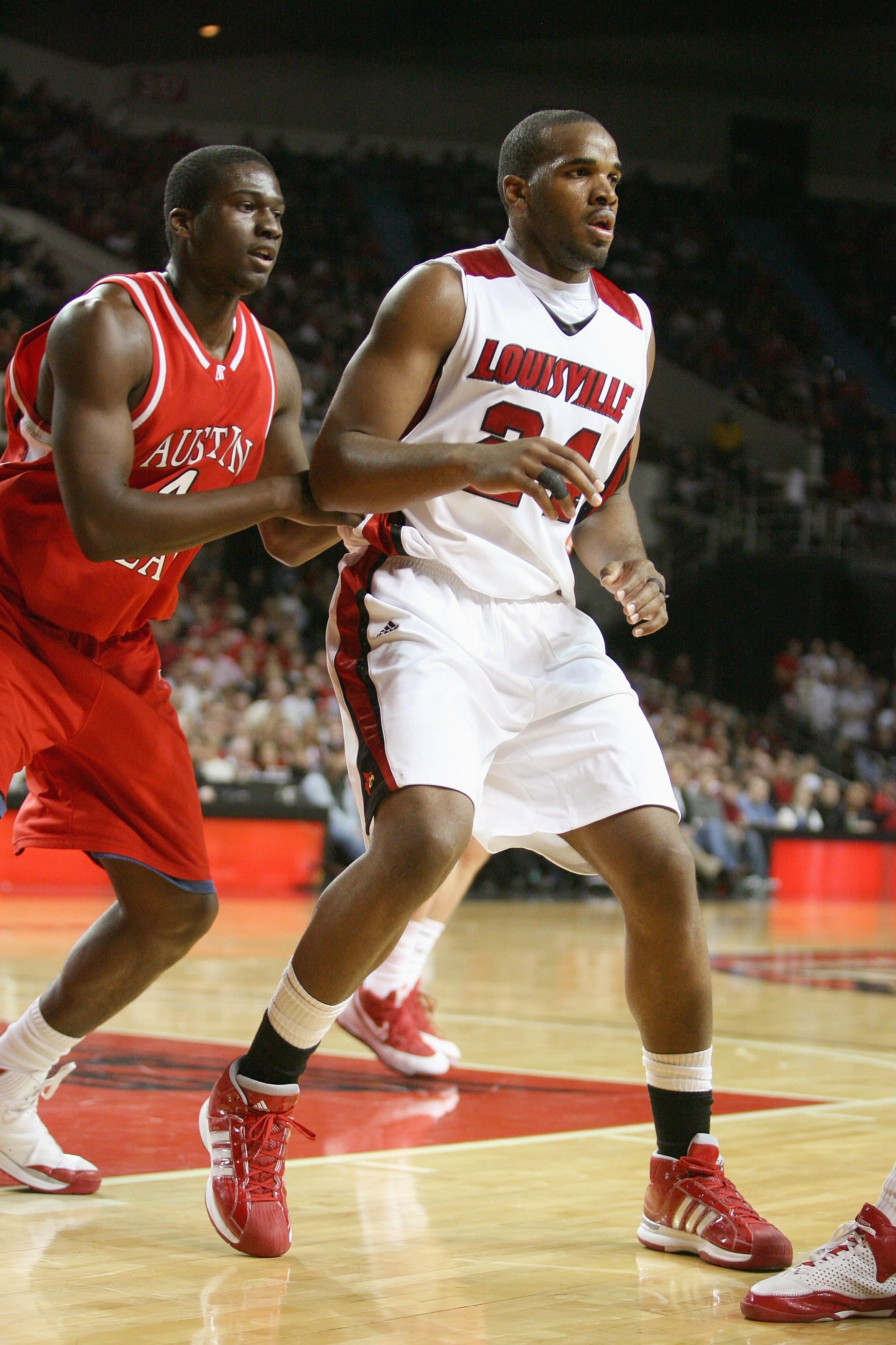LOUISVILLE, KY - DECEMBER 13: Samardo Samuels #24 of the Louisville Cardinals moves open against Marcel Williams #4 of the Austin Peay Governors at Freedom Hall on December 13, 2008 in Louisville, Kentucky. Cardinals defeated Austin Peay Governors 94-75.