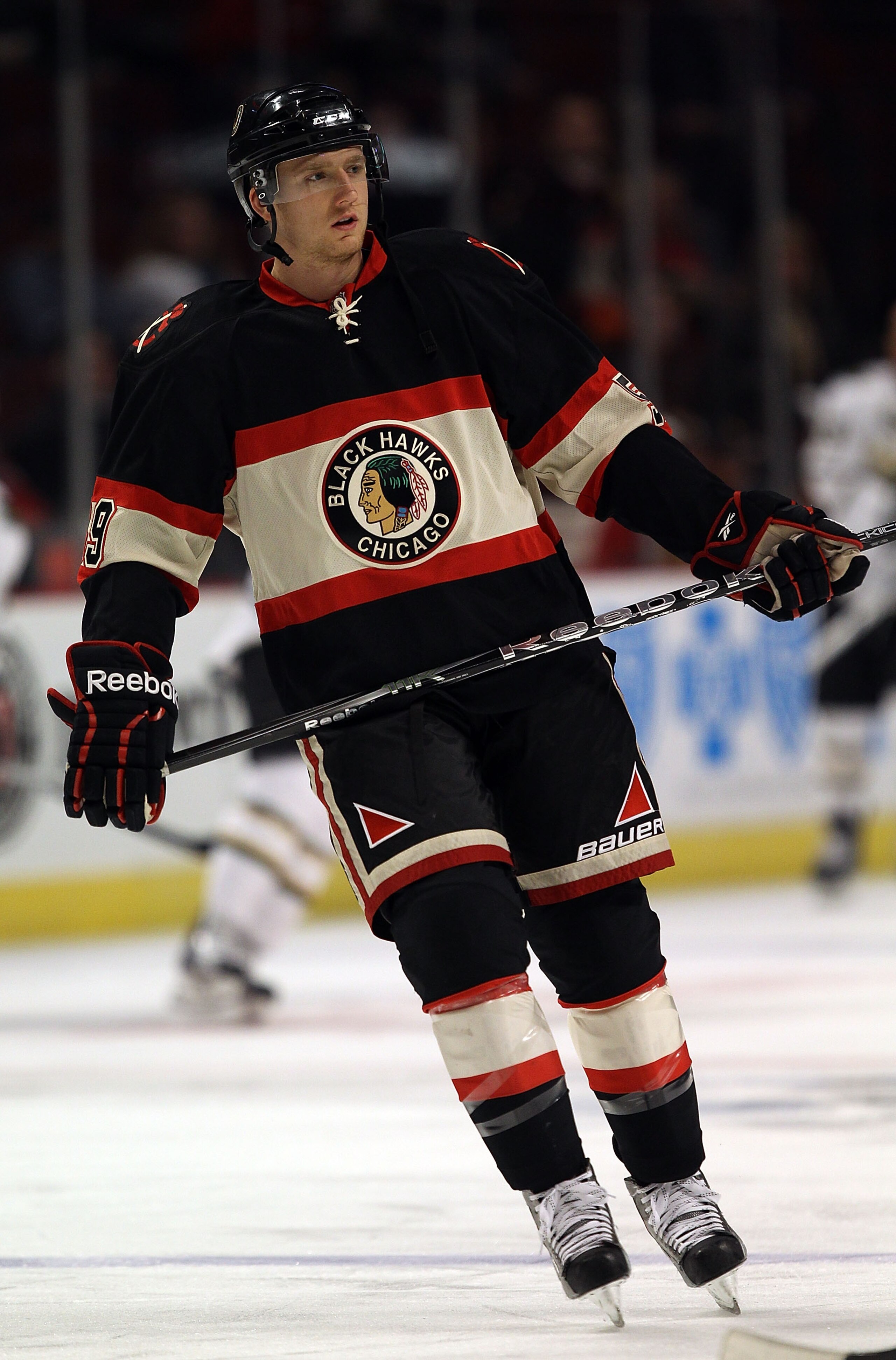 CHICAGO, IL - DECEMBER 08: Rob Klinkhammer #59 of the Chicago Blackhawks participates in warm-ups before a game against of the Dallas Stars at the United Center on December 8, 2010 in Chicago, Illinois. The Blackhawks defeated the Stars 5-3.  (Photo by Jo