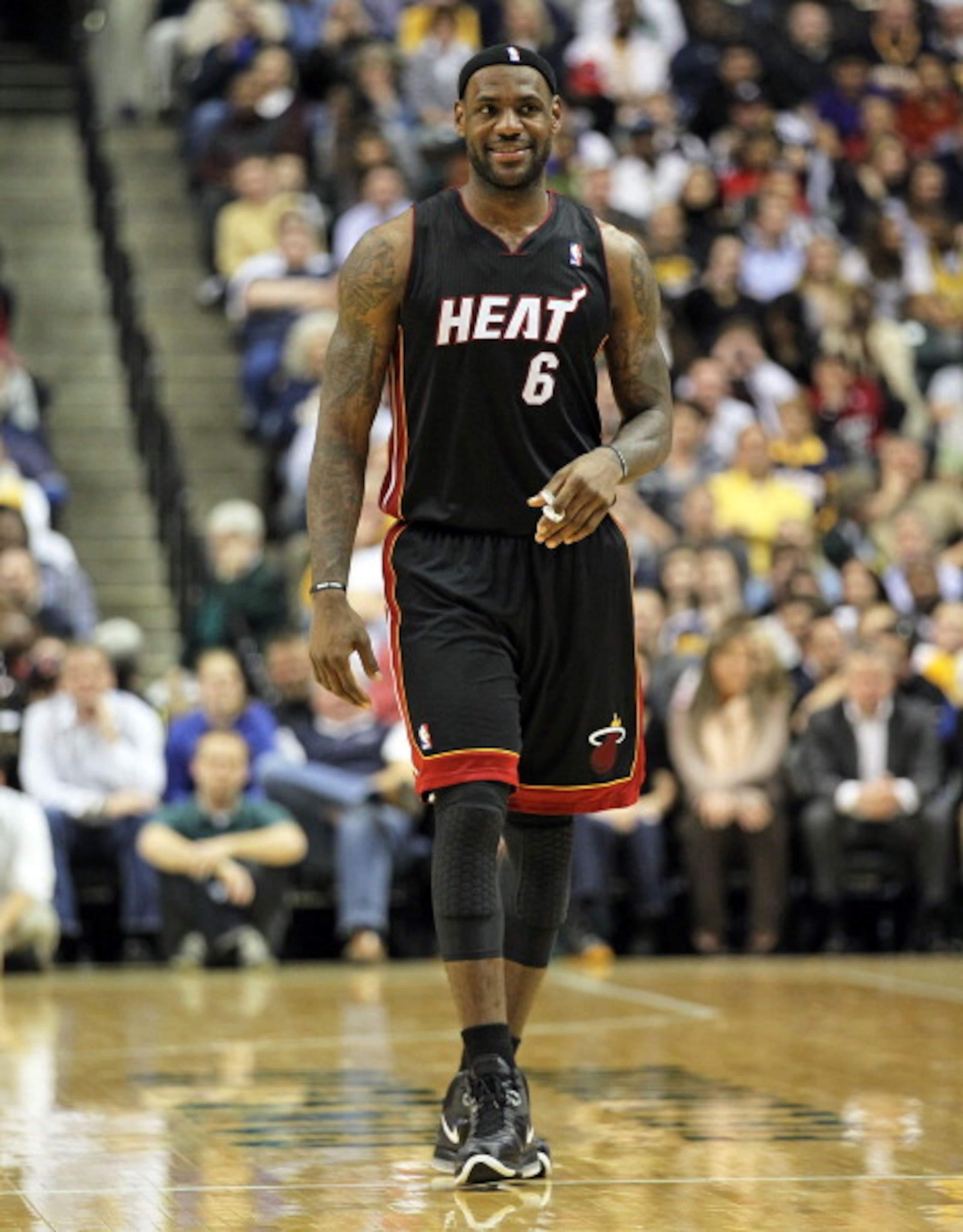 INDIANAPOLIS - FEBRUARY 15:  LeBron James #6 of the Miami Heat smiles during the NBA game against the Indiana Pacers at Conseco Fieldhouse on February 15, 2011 in Indianapolis, Indiana.   The Heat won 110-103.   NOTE TO USER: User expressly acknowledges a