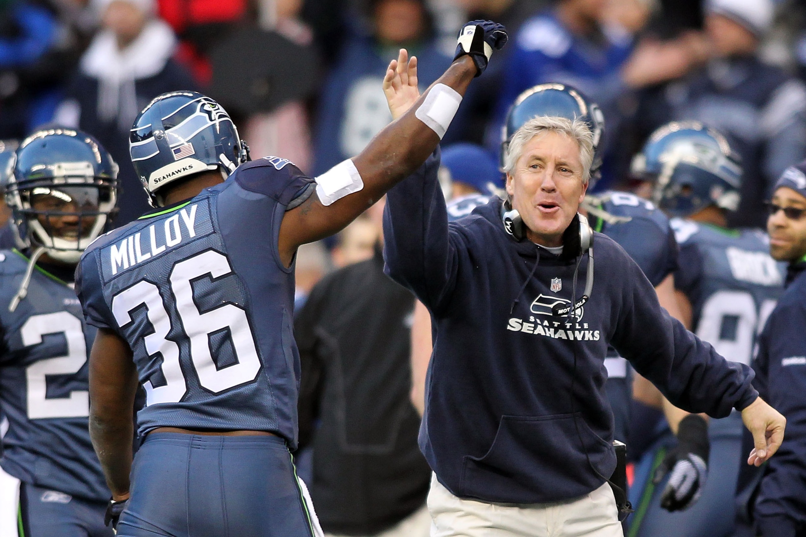SEATTLE, WA - JANUARY 08: Head coach Pete Carroll and Lawyer Milloy #36 of the Seattle Seahawks celebrate a fourth down stop by the Seahawks in the third quarter against the New Orleans Saints during the 2011 NFC wild-card playoff game at Qwest Field on SEATTLE, WA - JANUARY 08: Head coach Pete Carroll and Lawyer Milloy #36 of the Seattle Seahawks celebrate a fourth down stop by the Seahawks in the third quarter against the New Orleans Saints during the 2011 NFC wild-card playoff game at Qwest Field on