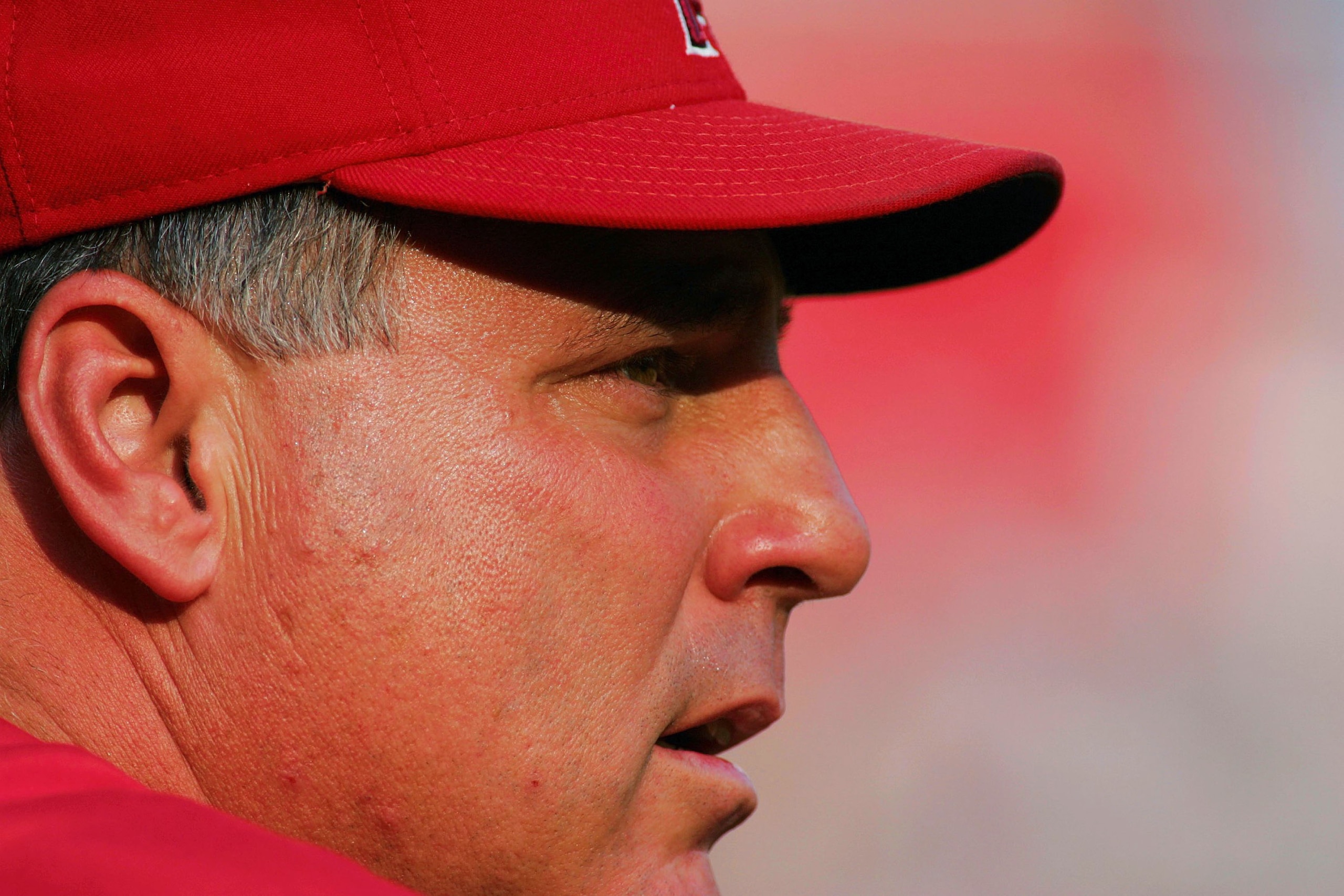 ARLINGTON, TX - JULY 21:  Manager Mike Scioscia of the Anaheim Angels watches play against the Texas Rangers on July 21, 2004 at Ameriquest Field in Arlington in Arlington, Texas. (Photo by Ronald Martinez/Getty Images)