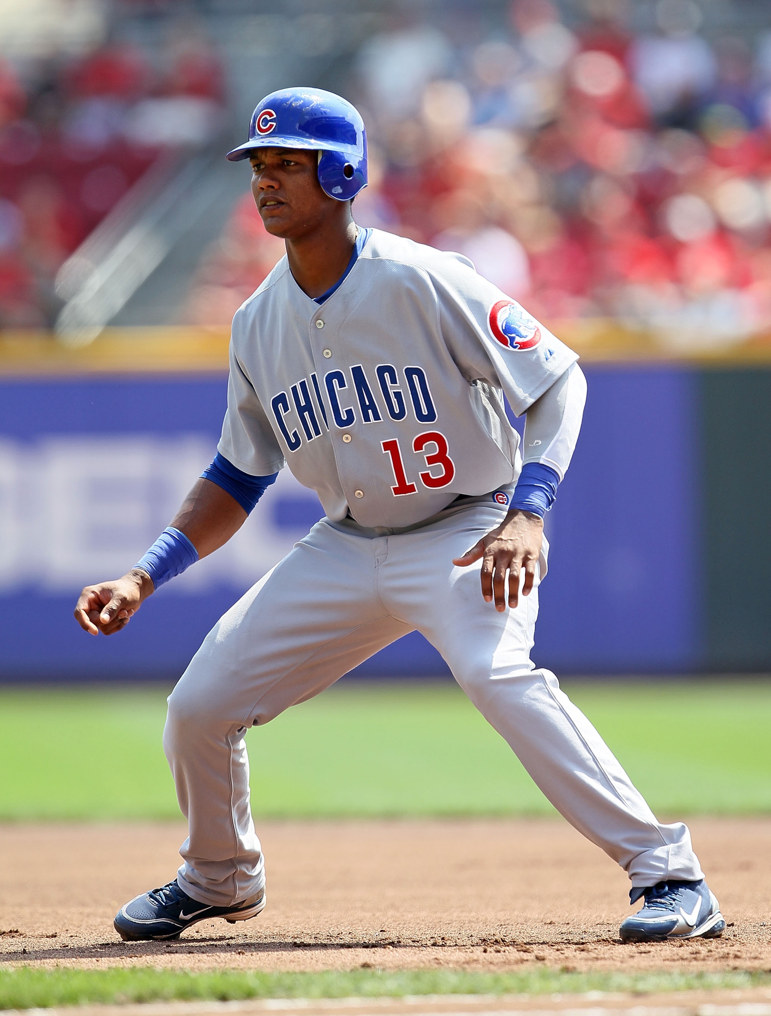 CINCINNATI - AUGUST 29:  Starlin Castro #13 of the Chicago Cubs leads off of first base during the game against the Cincinnati Reds at Great American Ball Park on August 29, 2010 in Cincinnati, Ohio.  (Photo by Andy Lyons/Getty Images)