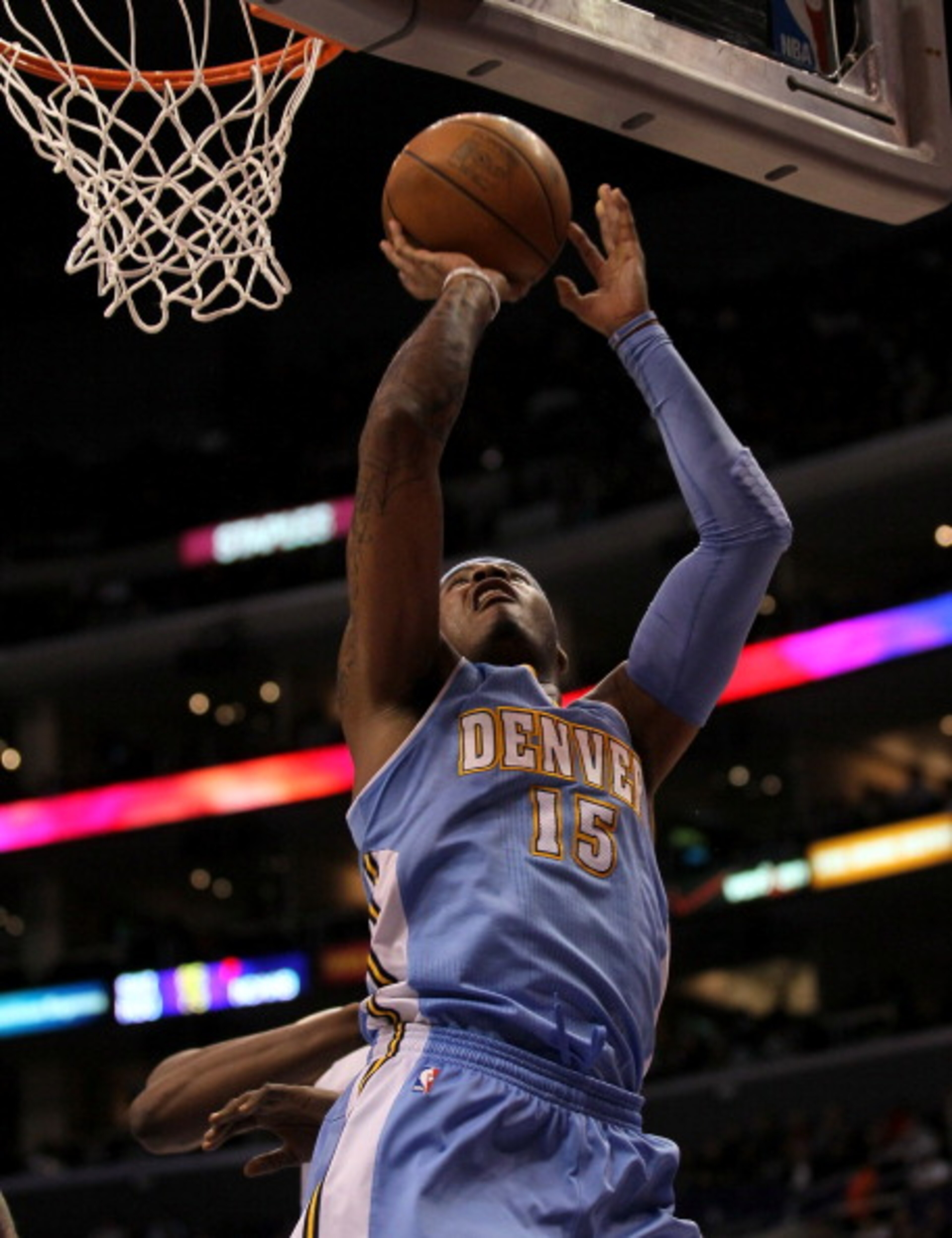 LOS ANGELES, CA - JANUARY 5: Carmelo Anthony #15 of the Denver Nuggets shoots against the Los Angeles Clippers at Staples Center on January 5, 2011 in Los Angeles, California. NOTE TO USER: User expressly acknowledges and agrees that, by downloading a LOS ANGELES, CA - JANUARY 5: Carmelo Anthony #15 of the Denver Nuggets shoots against the Los Angeles Clippers at Staples Center on January 5, 2011 in Los Angeles, California. NOTE TO USER: User expressly acknowledges and agrees that, by downloading a