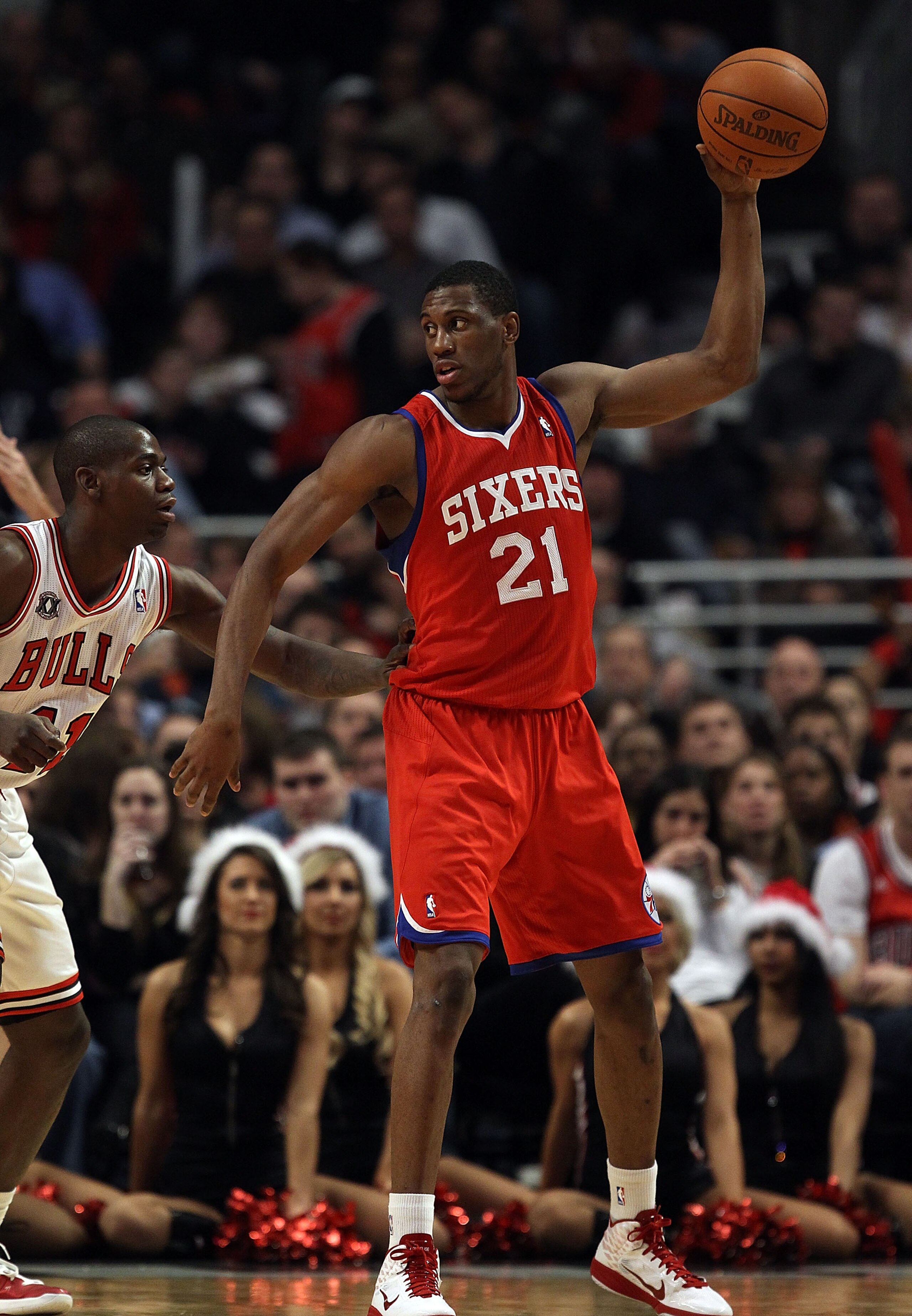 CHICAGO, IL - DECEMBER 21: Thaddeus Young #21 of the Philadelphia 76ers looks to pass against the Chicago Bulls at the United Center on December 21, 2010 in Chicago, Illinois. The Bulls defeated the 76ers 121-76. NOTE TO USER: User expressly acknowledges CHICAGO, IL - DECEMBER 21: Thaddeus Young #21 of the Philadelphia 76ers looks to pass against the Chicago Bulls at the United Center on December 21, 2010 in Chicago, Illinois. The Bulls defeated the 76ers 121-76. NOTE TO USER: User expressly acknowledges
