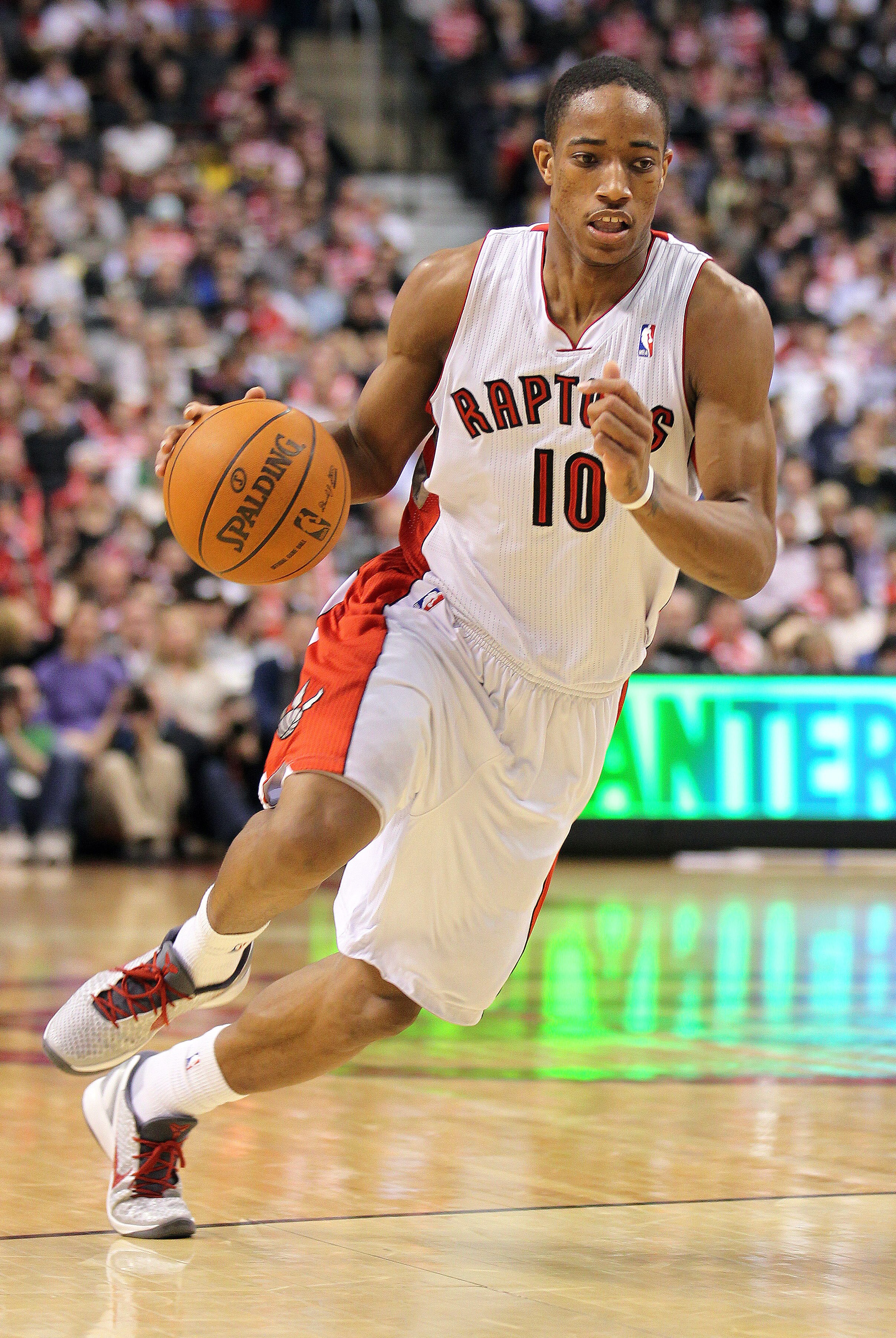 TORONTO, CANADA - FEBRUARY 16:  DeMar DeRozan #10 of the Toronto Raptors drives with the ball in a game against the Miami Heat on February 16, 2011 at the Air Canada Centre in Toronto, Canada. The Heat defeated the Raptors 103-95. (Photo by Claus Andersen