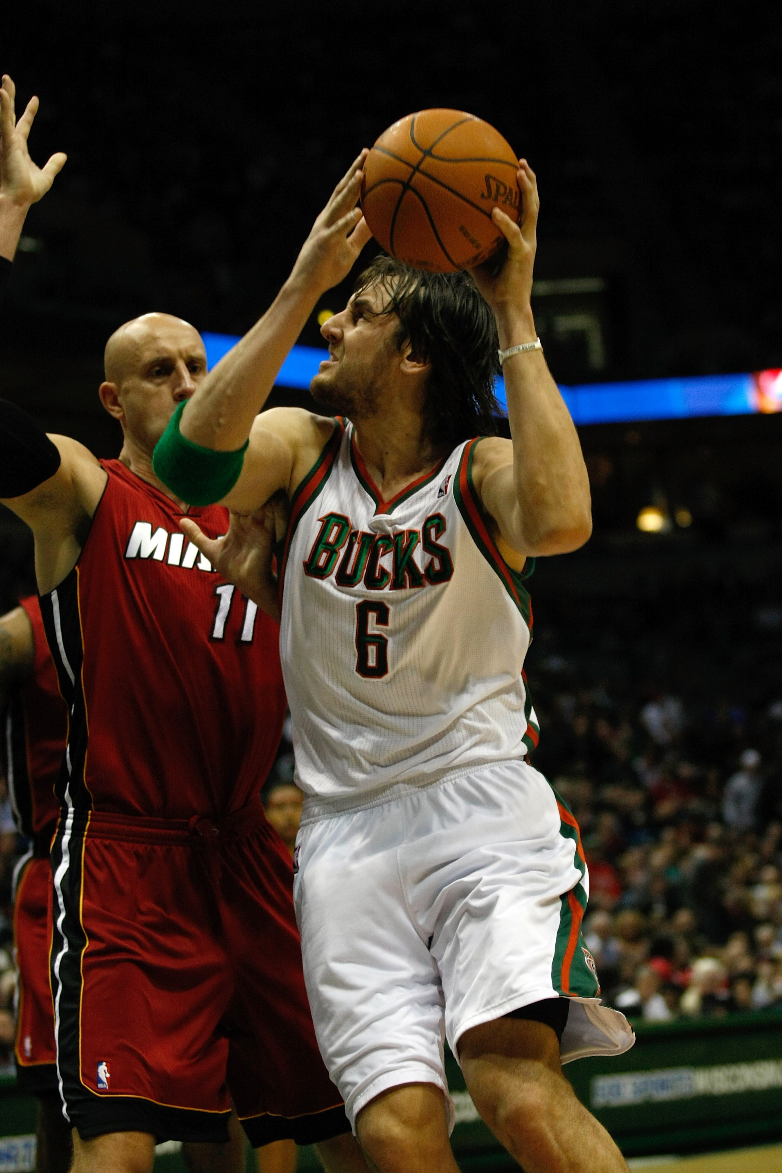 MILWAUKEE, WI - JANUARY 07: Andrew Bogut #6 of the Milwaukee Bucks shoots against the Miami Heat at the Bradley Center on January 7, 2011 in Milwaukee, Wisconsin. NOTE TO USER: User expressly acknowledges and agrees that, by downloading and or using this