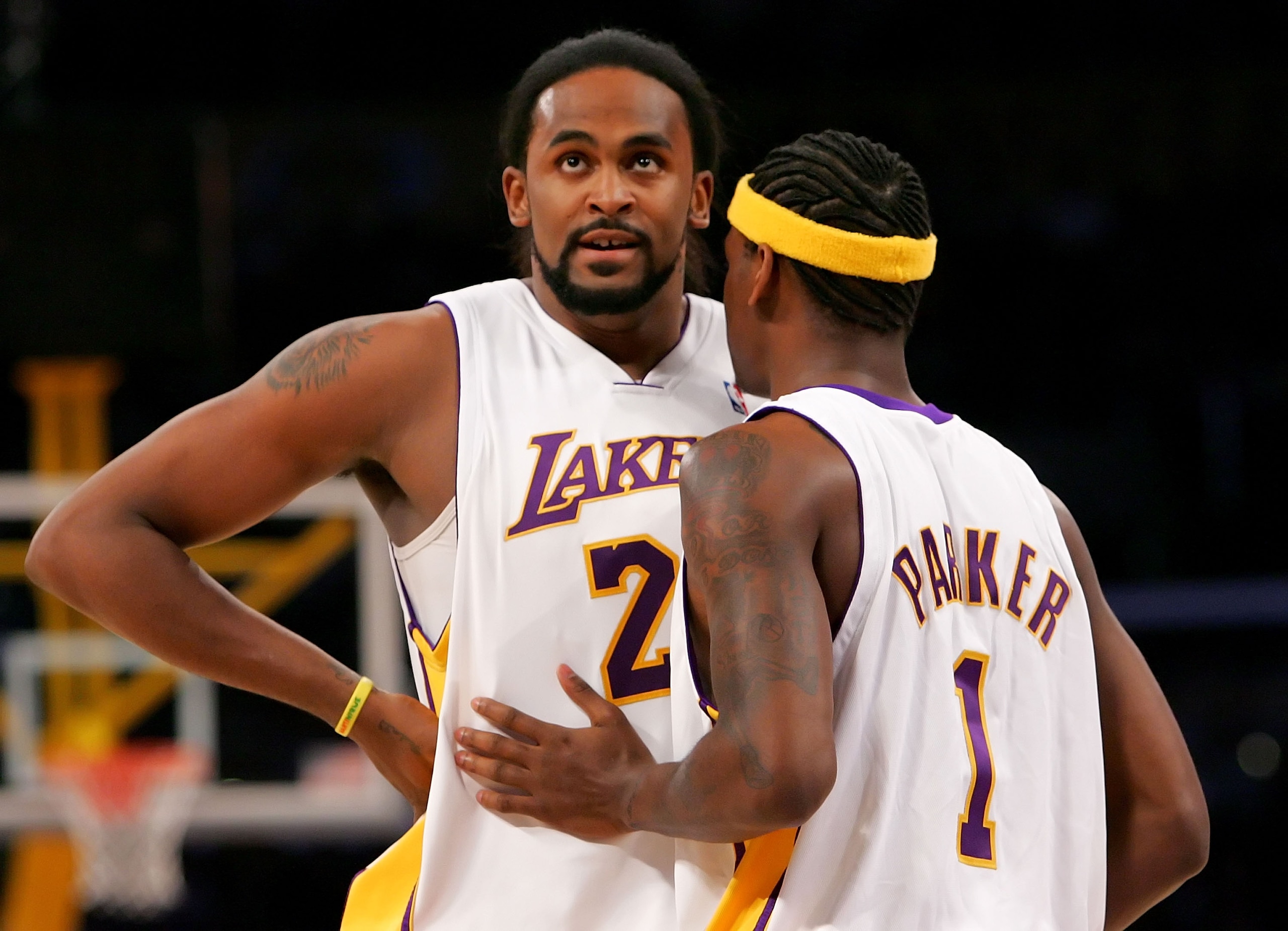 LOS ANGELES - APRIL 29: Ronny Turiaf #21 and Smush Parker #1 of the Los Angeles Lakers talk on the court in Game Four of the Western Conference Quarterfinals against the Phoenix Suns during the 2007 NBA Playoff at Staples Center on April 29, 2007 in Los LOS ANGELES - APRIL 29: Ronny Turiaf #21 and Smush Parker #1 of the Los Angeles Lakers talk on the court in Game Four of the Western Conference Quarterfinals against the Phoenix Suns during the 2007 NBA Playoff at Staples Center on April 29, 2007 in Los