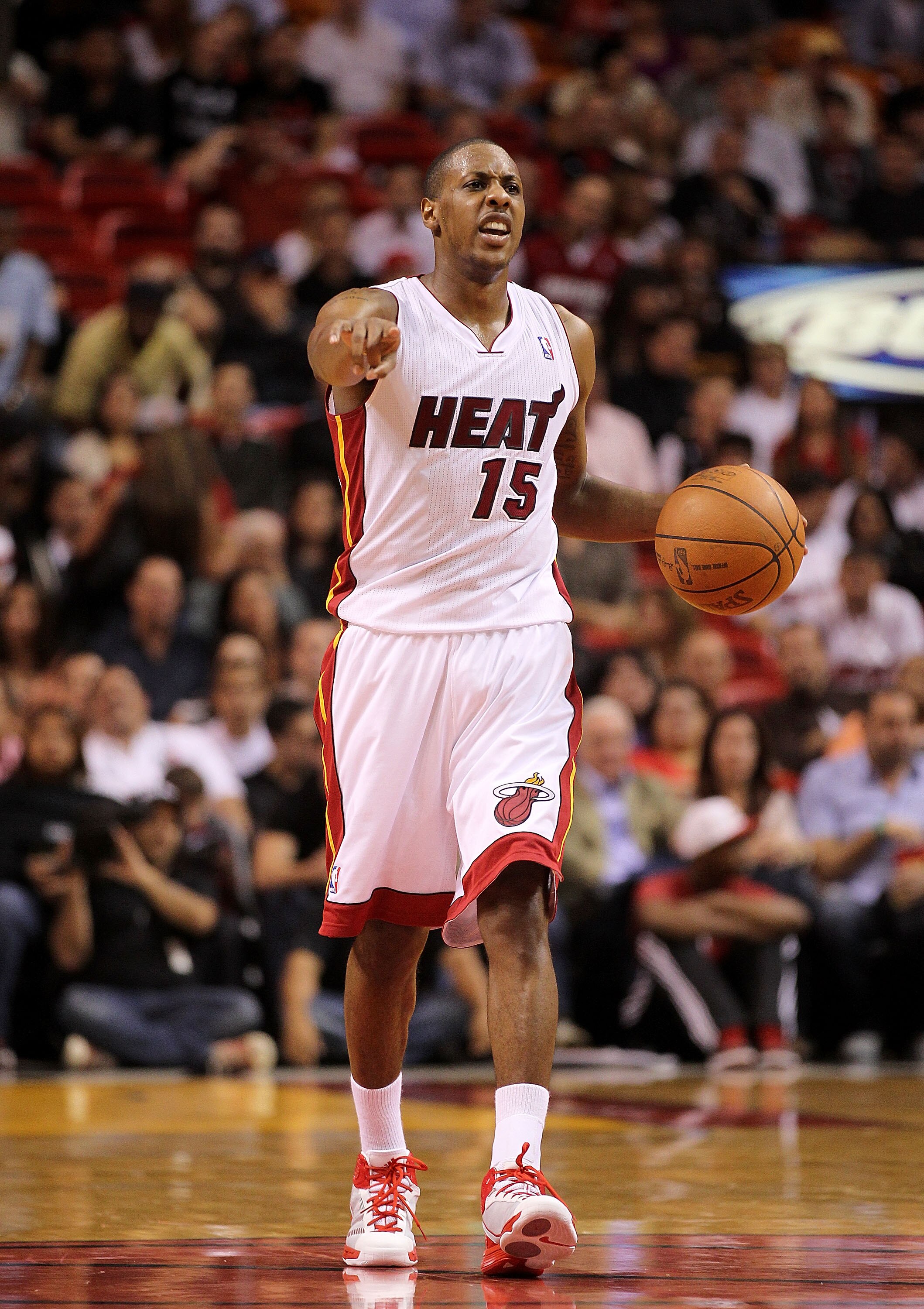 MIAMI, FL - FEBRUARY 08: Mario Chalmers #15 of the Miami Heat calls a play during a game against the Indiana Pacers at American Airlines Arena on February 8, 2011 in Miami, Florida. NOTE TO USER: User expressly acknowledges and agrees that, by downloading