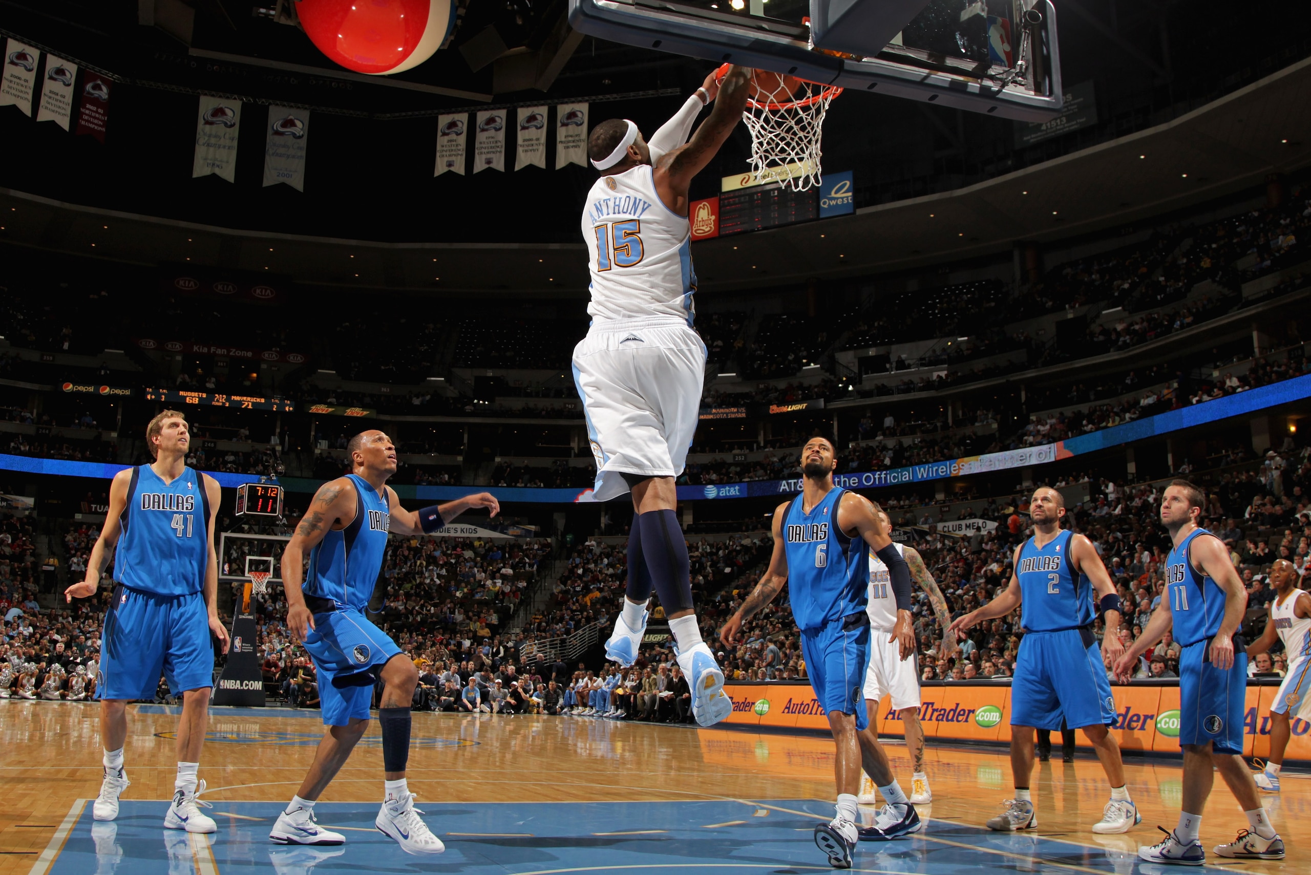 DENVER, CO - FEBRUARY 10:  Carmelo Anthony #15 of the Denver Nuggets dunks the ball against the Dallas Mavericks during NBA action at the Pepsi Center on February 10, 2011 in Denver, Colorado. The Nuggets defeated the Mavericks 121-120. NOTE TO USER: User