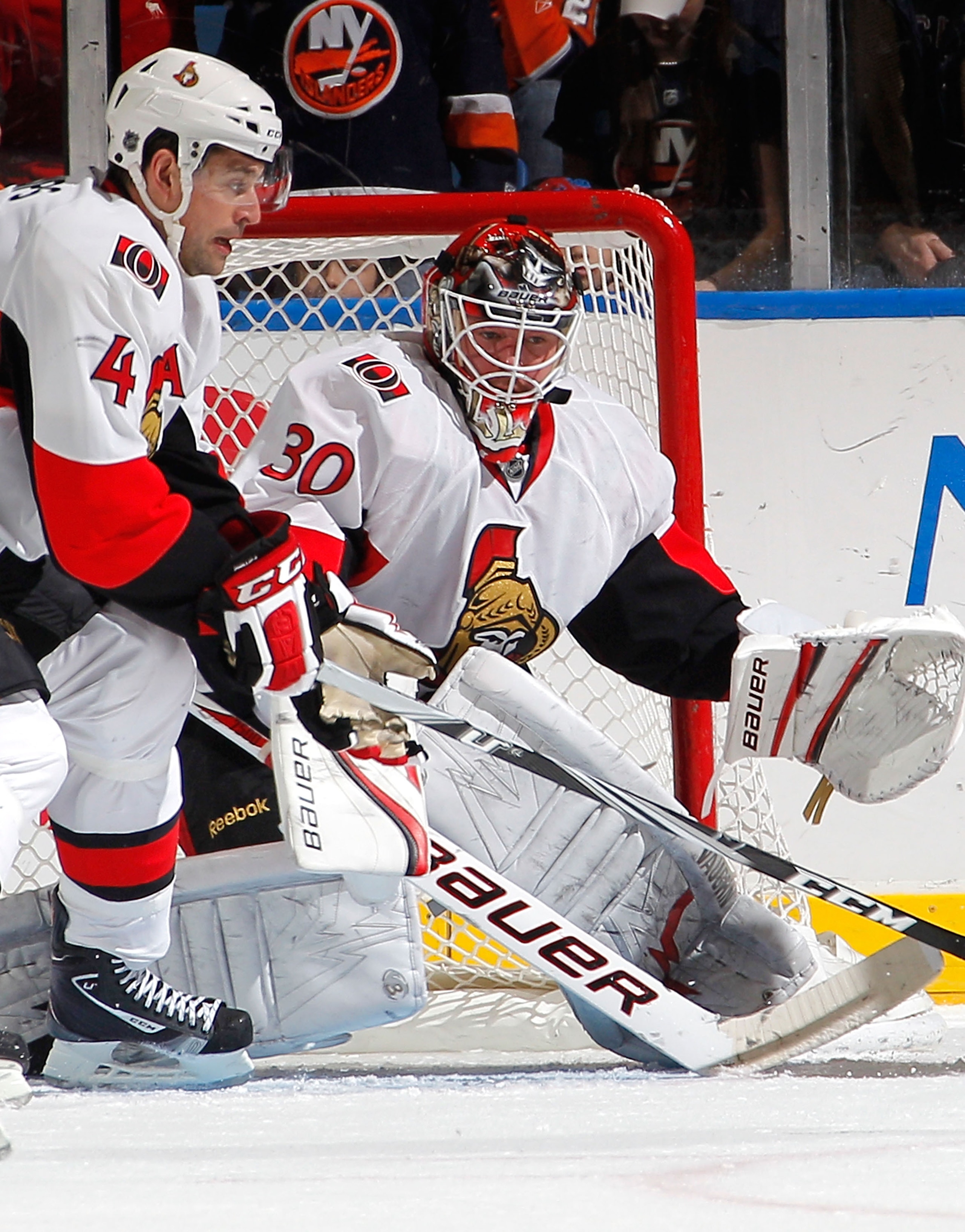 UNIONDALE, NY - FEBRUARY 05:  Goalie Brian Elliott #30 of the Ottawa Senators makes a save during an NHL hockey game against the New York Islanders at Nassau Coliseum on February 5, 2011 in Uniondale, New York.  (Photo by Paul Bereswill/Getty Images)