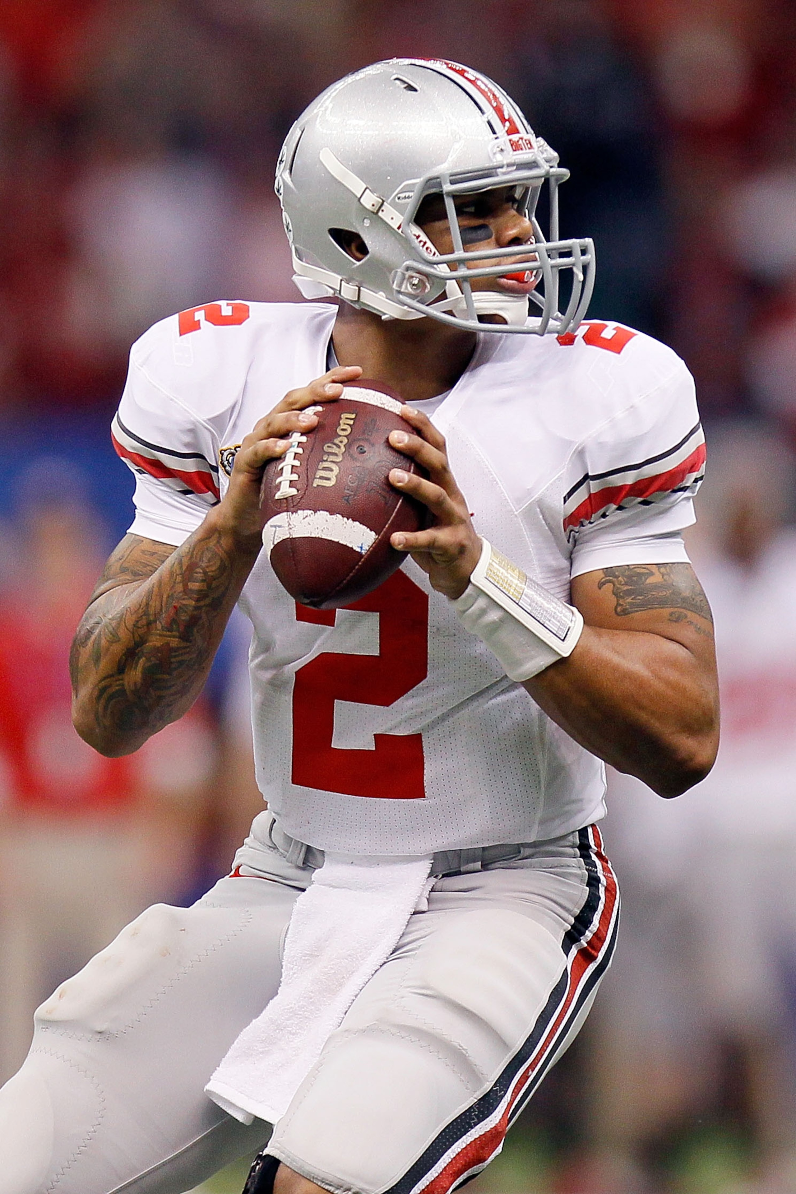 NEW ORLEANS, LA - JANUARY 04: Quarterback Terrelle Pryor #2 of the Ohio State Buckeyes looks to pass against the Arkansas Razorbacks during the Allstate Sugar Bowl at the Louisiana Superdome on January 4, 2011 in New Orleans, Louisiana. (Photo by Kevin NEW ORLEANS, LA - JANUARY 04: Quarterback Terrelle Pryor #2 of the Ohio State Buckeyes looks to pass against the Arkansas Razorbacks during the Allstate Sugar Bowl at the Louisiana Superdome on January 4, 2011 in New Orleans, Louisiana. (Photo by Kevin
