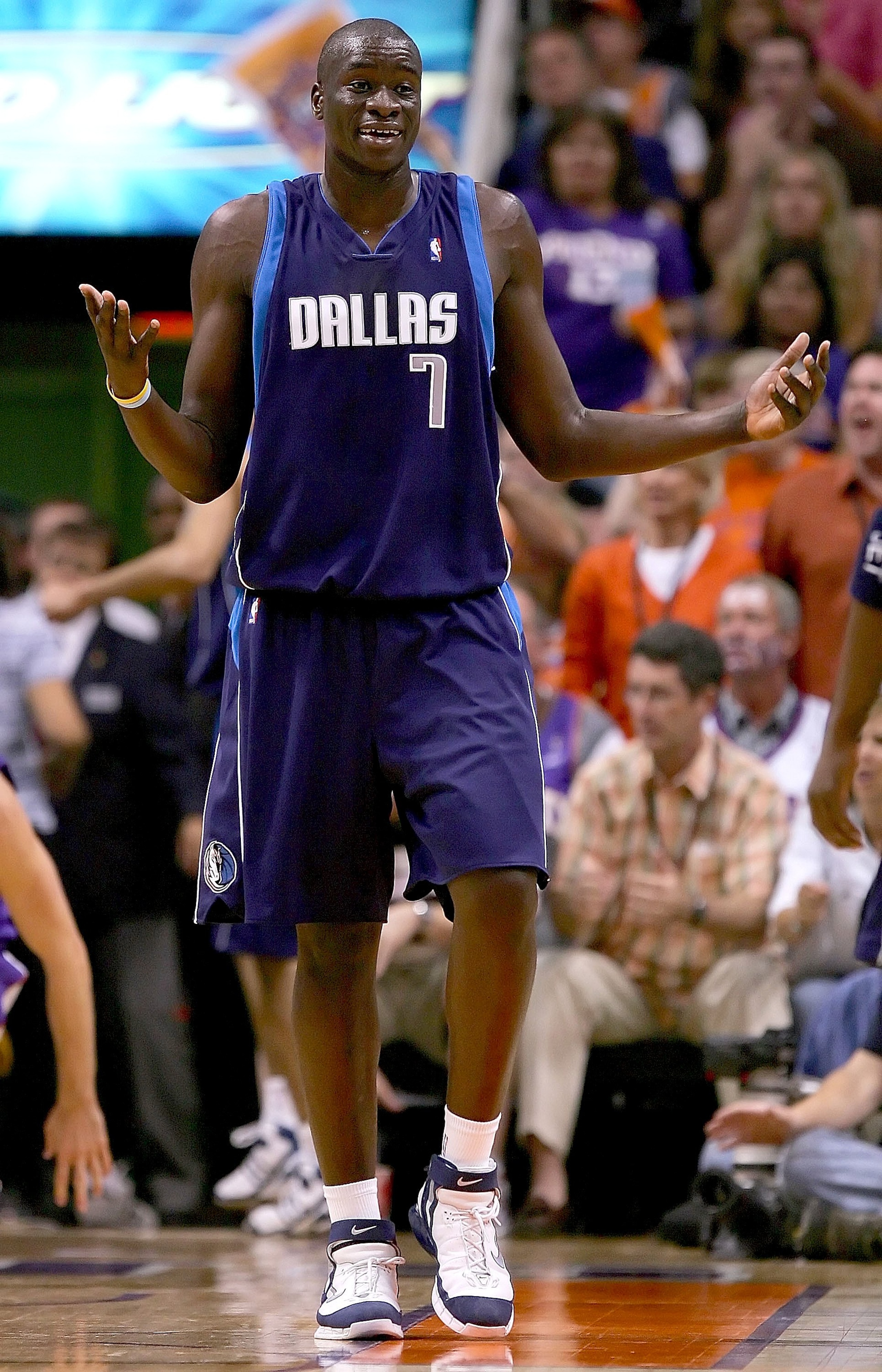 PHOENIX - MAY 28: DeSagna Diop #7 of the Dallas Mavericks reacts to a call in the first half against the Phoenix Suns in game three of the Western Conference Finals during the 2006 NBA Playoffs on May 28, 2006 at US Airways Center in Phoenix, Arizona. N PHOENIX - MAY 28: DeSagna Diop #7 of the Dallas Mavericks reacts to a call in the first half against the Phoenix Suns in game three of the Western Conference Finals during the 2006 NBA Playoffs on May 28, 2006 at US Airways Center in Phoenix, Arizona. N