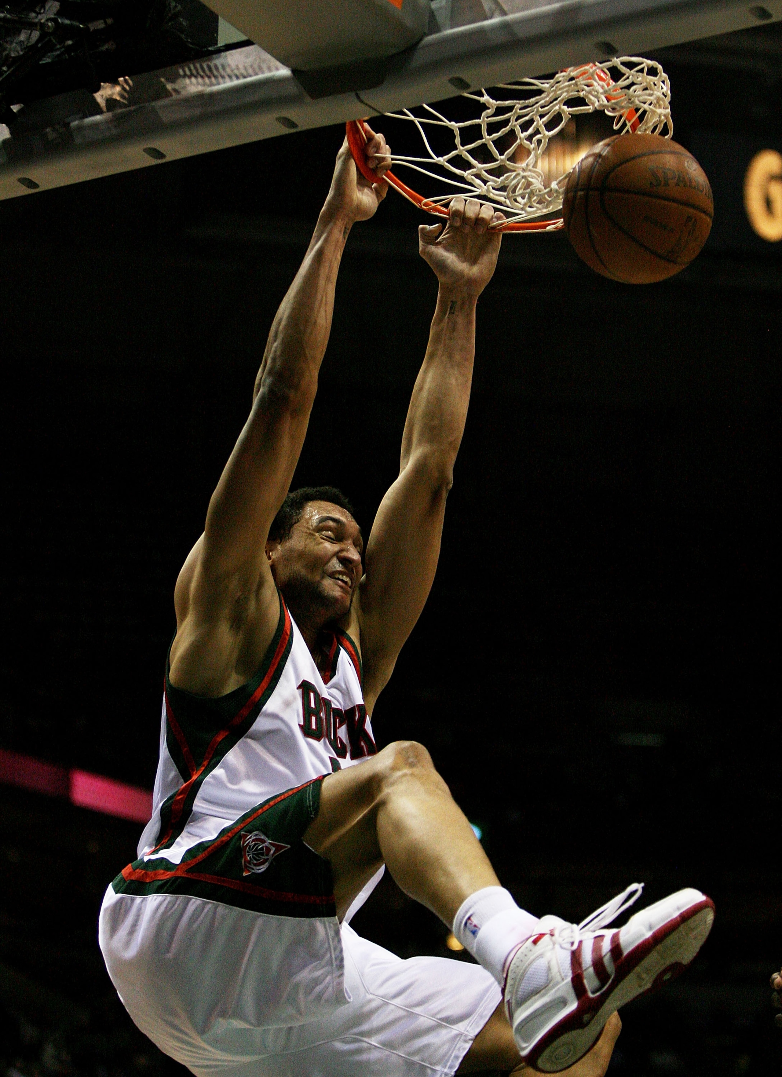 MILWAUKEE - FEBRUARY 09: Dan Gadzuric #50 of the Milwaukee Bucks dunks the ball against the Houston Rockets on February 9, 2009 at the Bradley Center in Milwaukee, Wisconsin. The Bucks defeated the Rockets 124-112. NOTE TO USER: User expressly acknowledge MILWAUKEE - FEBRUARY 09: Dan Gadzuric #50 of the Milwaukee Bucks dunks the ball against the Houston Rockets on February 9, 2009 at the Bradley Center in Milwaukee, Wisconsin. The Bucks defeated the Rockets 124-112. NOTE TO USER: User expressly acknowledge