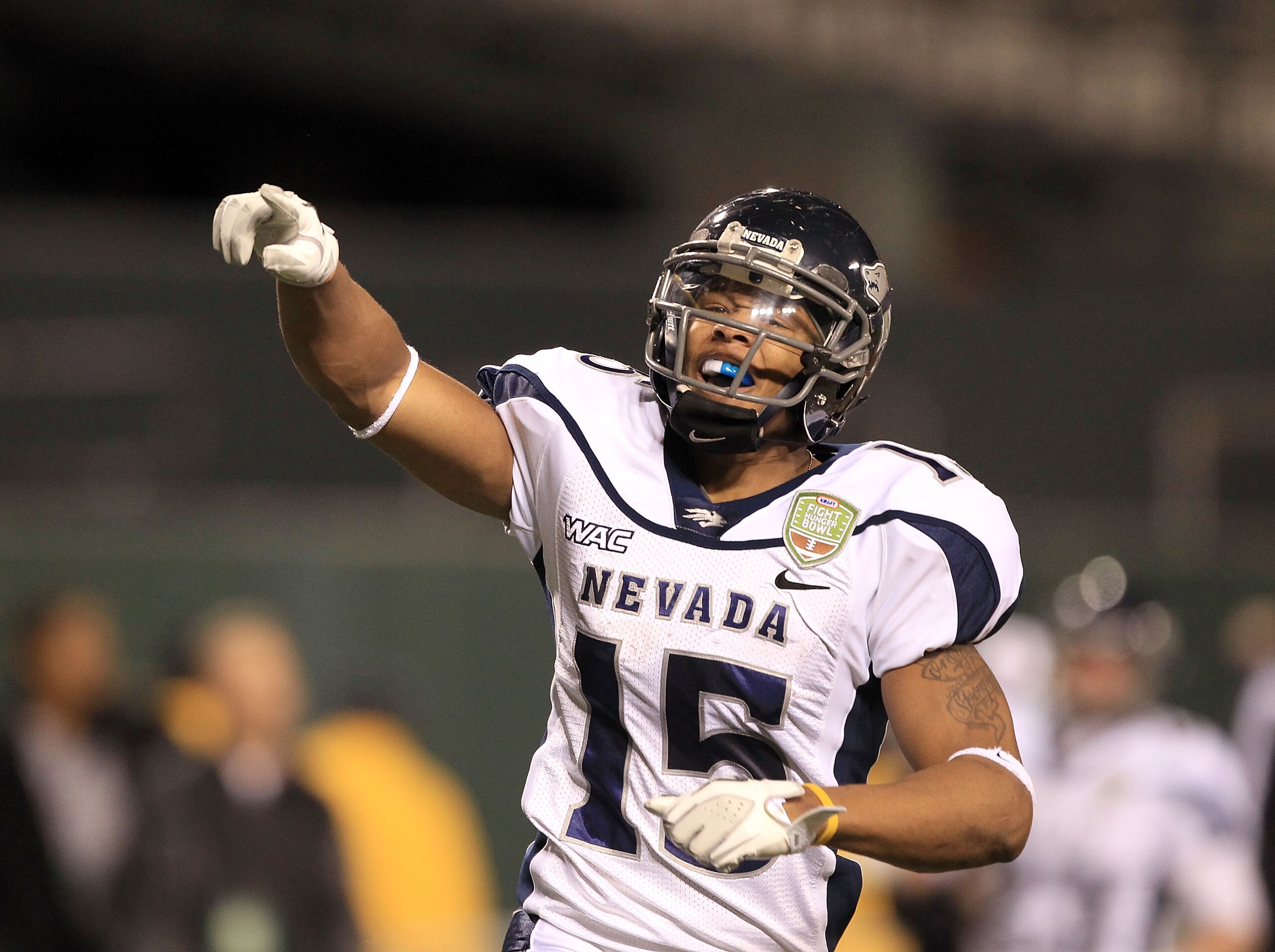 SAN FRANCISCO, CA - JANUARY 09: Richard Matthews #15 of the Nevada Wolf Pack celebrates after he returned a punt for a touchdown in their game against Boston College during the Kraft Fight Hunger Bowl at AT&T Park on January 9, 2011 in San Francisco, Cal SAN FRANCISCO, CA - JANUARY 09: Richard Matthews #15 of the Nevada Wolf Pack celebrates after he returned a punt for a touchdown in their game against Boston College during the Kraft Fight Hunger Bowl at AT&T Park on January 9, 2011 in San Francisco, Cal