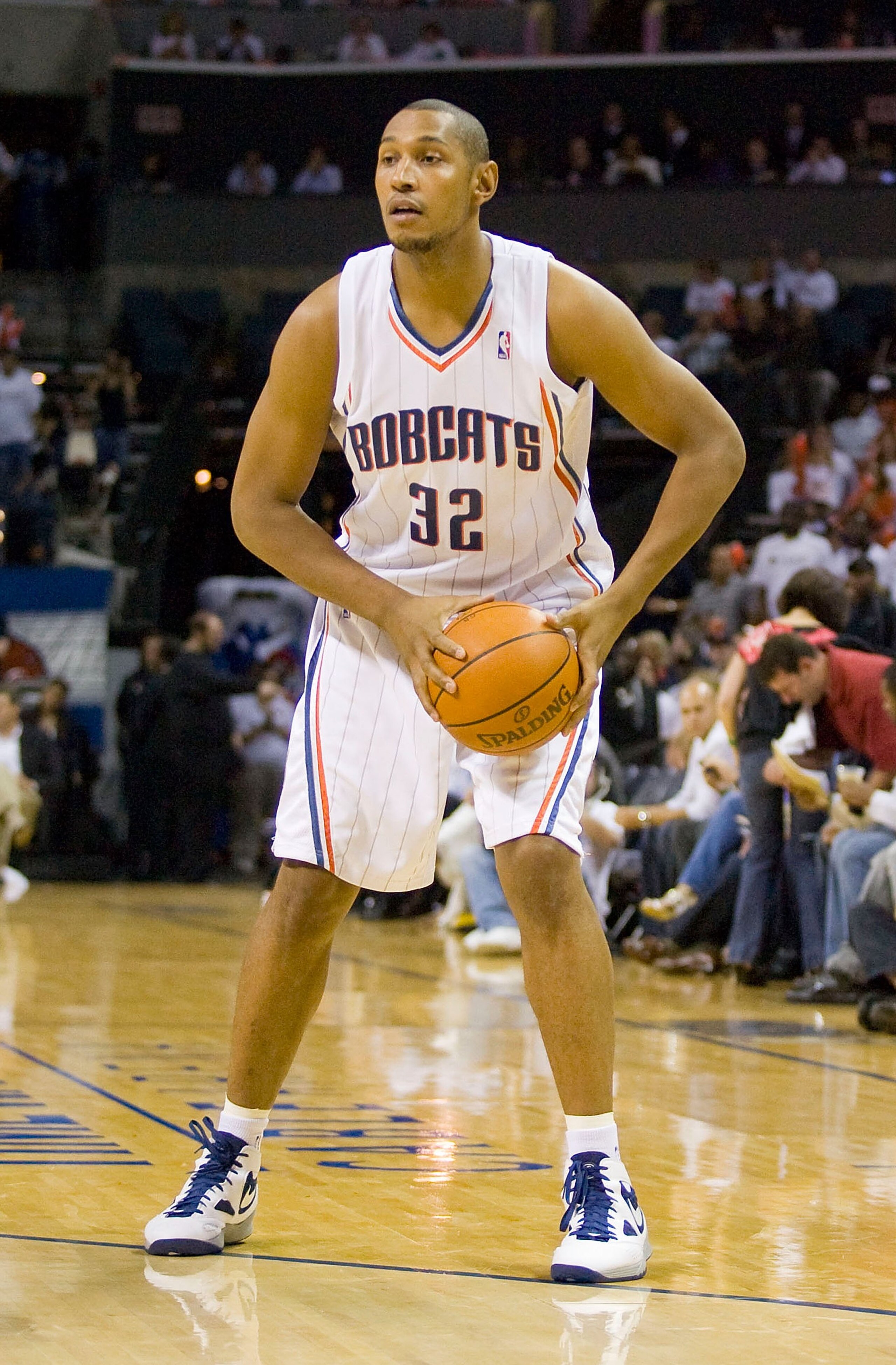 CHARLOTTE, NC - APRIL 26: Bors Diaw #32 of the Charlotte Bobcats looks for an open teammate against the Orlando Magic at Time Warner Cable Arena on April 26, 2010 in Charlotte, North Carolina.  The Magic defeated the Bobcats 99-90 to complete the four gam