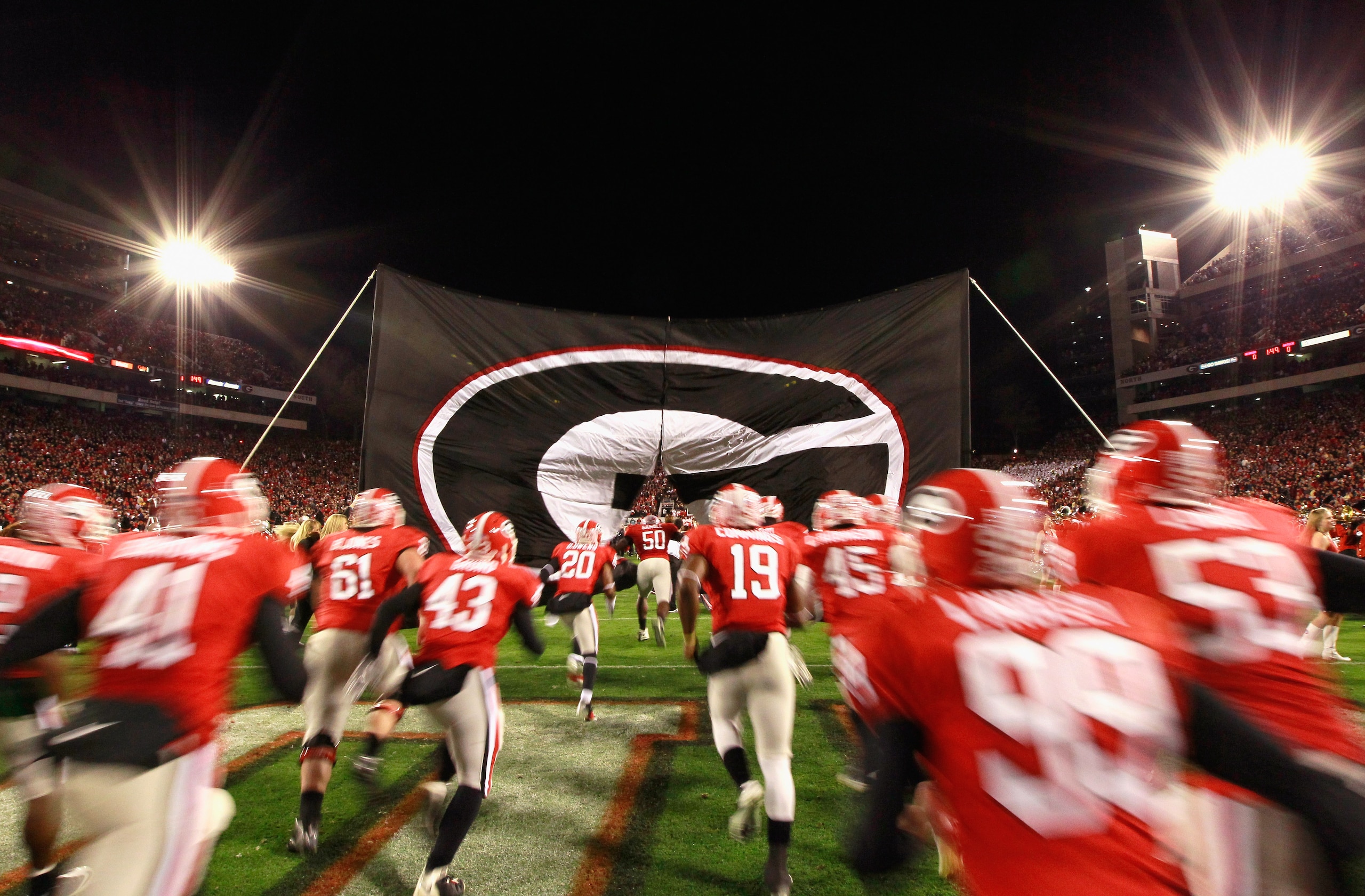 ATHENS, GA - NOVEMBER 27: The Georgia Bulldogs enter the field to face the Georgia Tech Yellow Jackets at Sanford Stadium on November 27, 2010 in Athens, Georgia. (Photo by Kevin C. Cox/Getty Images) ATHENS, GA - NOVEMBER 27: The Georgia Bulldogs enter the field to face the Georgia Tech Yellow Jackets at Sanford Stadium on November 27, 2010 in Athens, Georgia. (Photo by Kevin C. Cox/Getty Images)