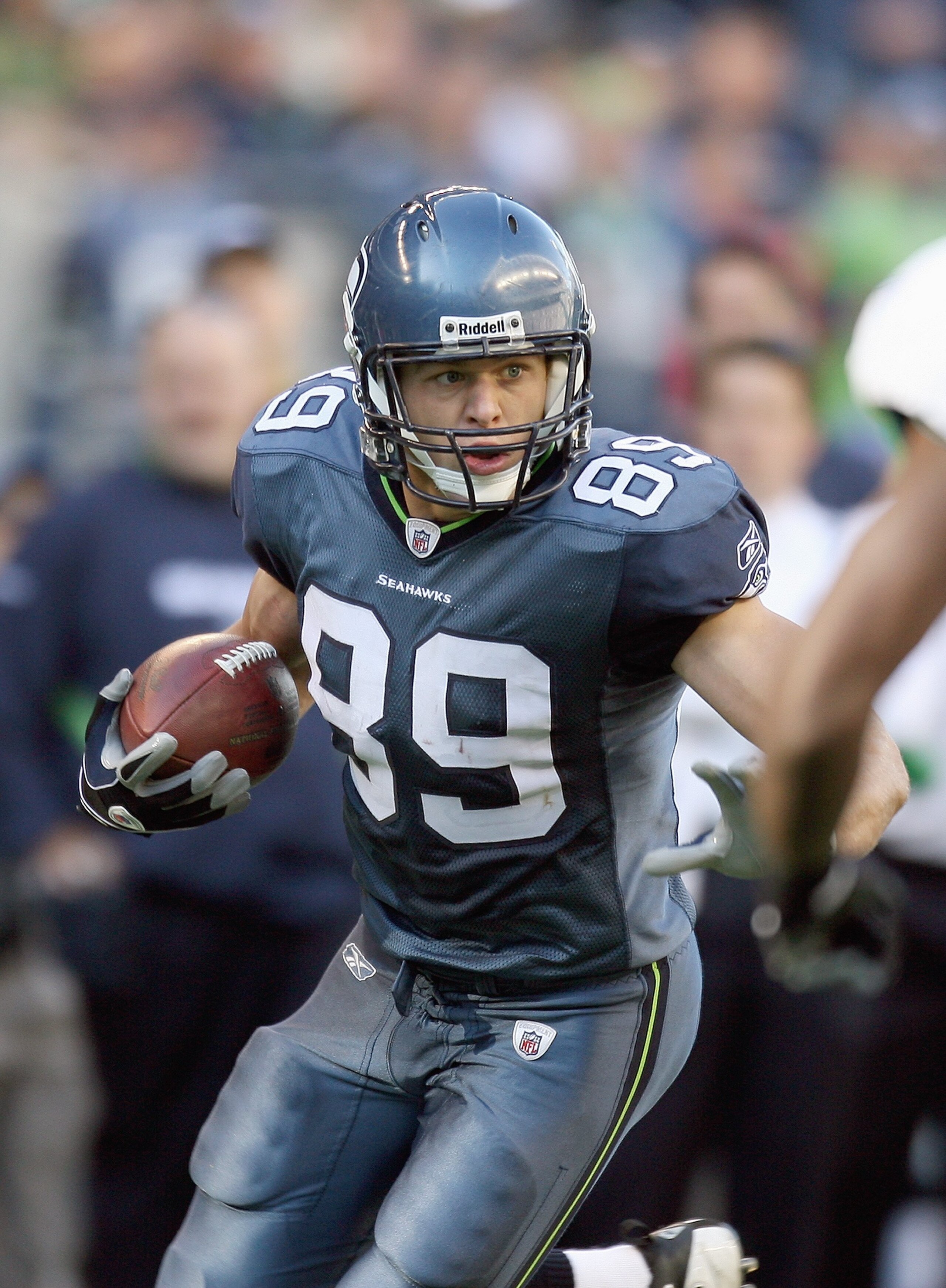 SEATTLE - OCTOBER 11: John Carlson #89 of the Seattle Seahawks carries the ball during the game against the Jacksonville Jaguars on October 11, 2009 at Qwest Field in Seattle, Washington. The Seahawks defeated the Jaguars 41-0. (Photo by Otto Greule Jr/Ge SEATTLE - OCTOBER 11: John Carlson #89 of the Seattle Seahawks carries the ball during the game against the Jacksonville Jaguars on October 11, 2009 at Qwest Field in Seattle, Washington. The Seahawks defeated the Jaguars 41-0. (Photo by Otto Greule Jr/Ge