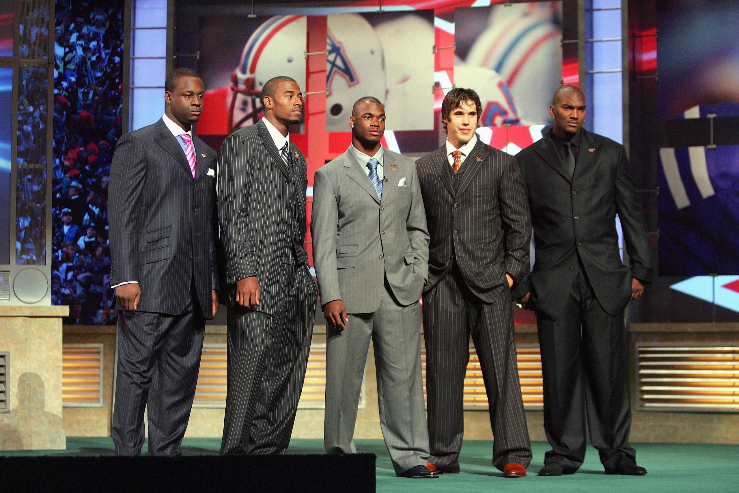 NEW YORK - APRIL 28:  Defensive end Gaines Adams of Clemson, wide receiver Calvin Johnson of Georgia Tech, running back Adrian Peterson of Oklahoma, quarterback Brady Quinn of Notre Dame, and quarterback JaMarcus Russell of Louisiana State University pose