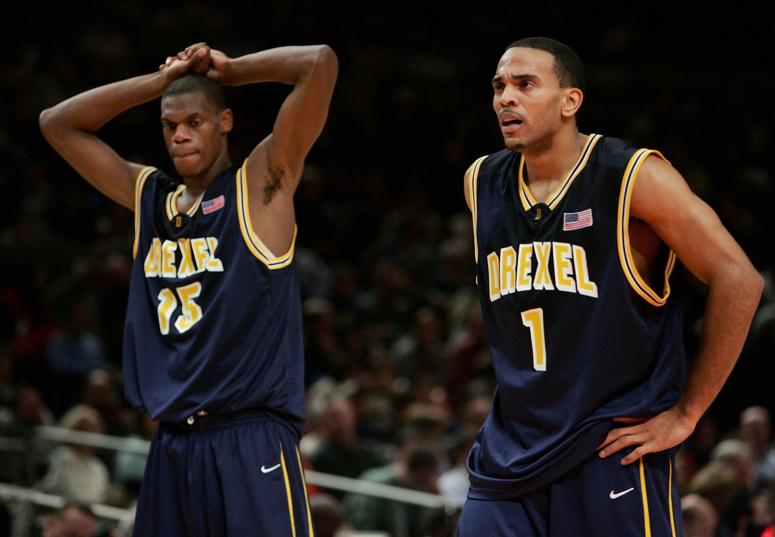 NEW YORK - NOVEMBER 25:  Frank Elegar #15 and Kenell Sanchez #1 of the Drexel Dragons react to losing their Preseason NIT Tournament game to the UCLA Bruins at Madison Square Garden on November 25, 2005 in New York City.  (Photo by Nick Laham/Getty Images