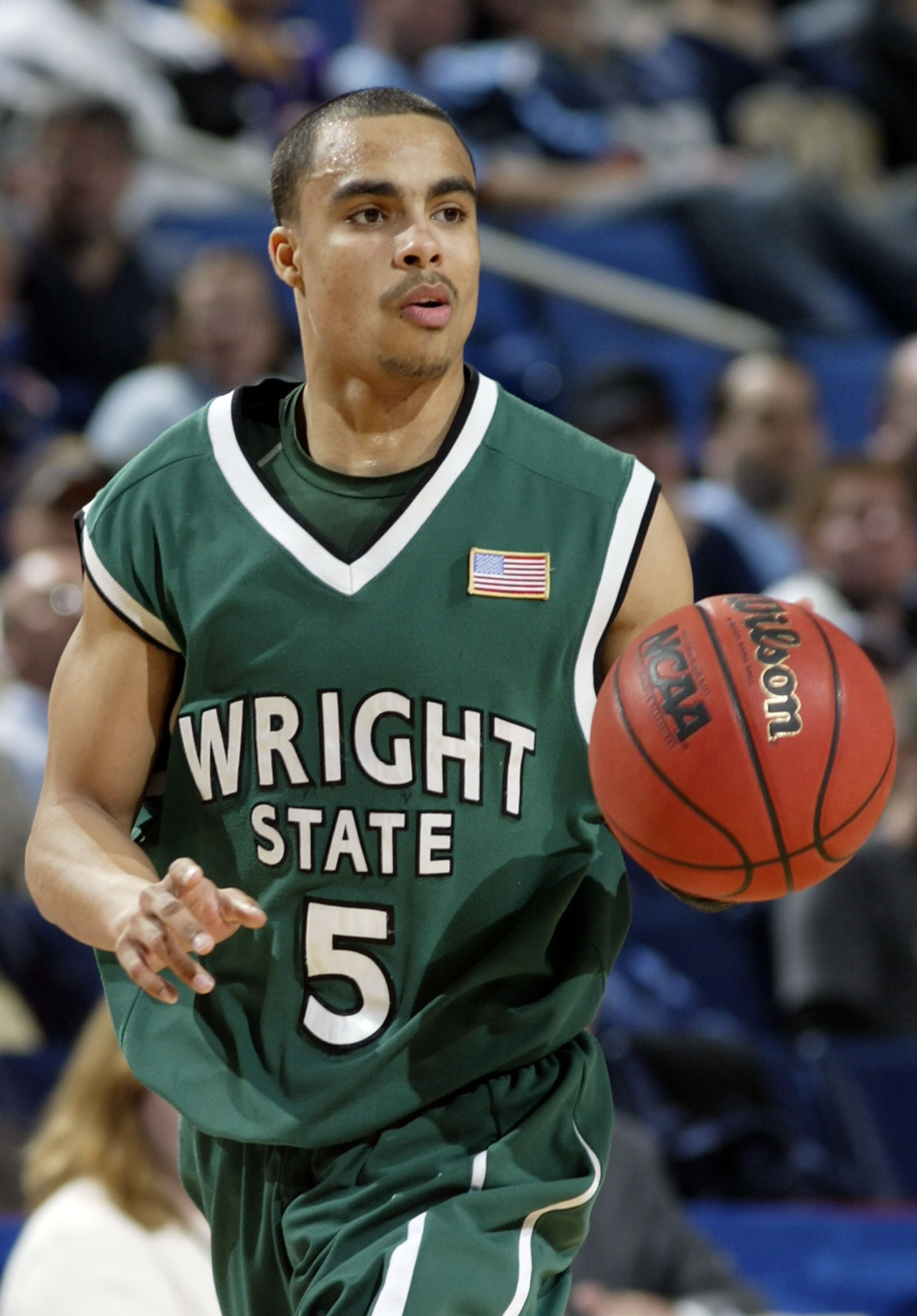 BUFFALO, NY - MARCH 15:   Dashaun Wood  #5 of the Wright State Raiders takes the ball upcourt against the Pittsburgh Panthers during round one of the NCAA Men's Basketball Tournament at the HSBC Arena on March 15, 2007  in Buffalo, New York.  (Photo by Ri