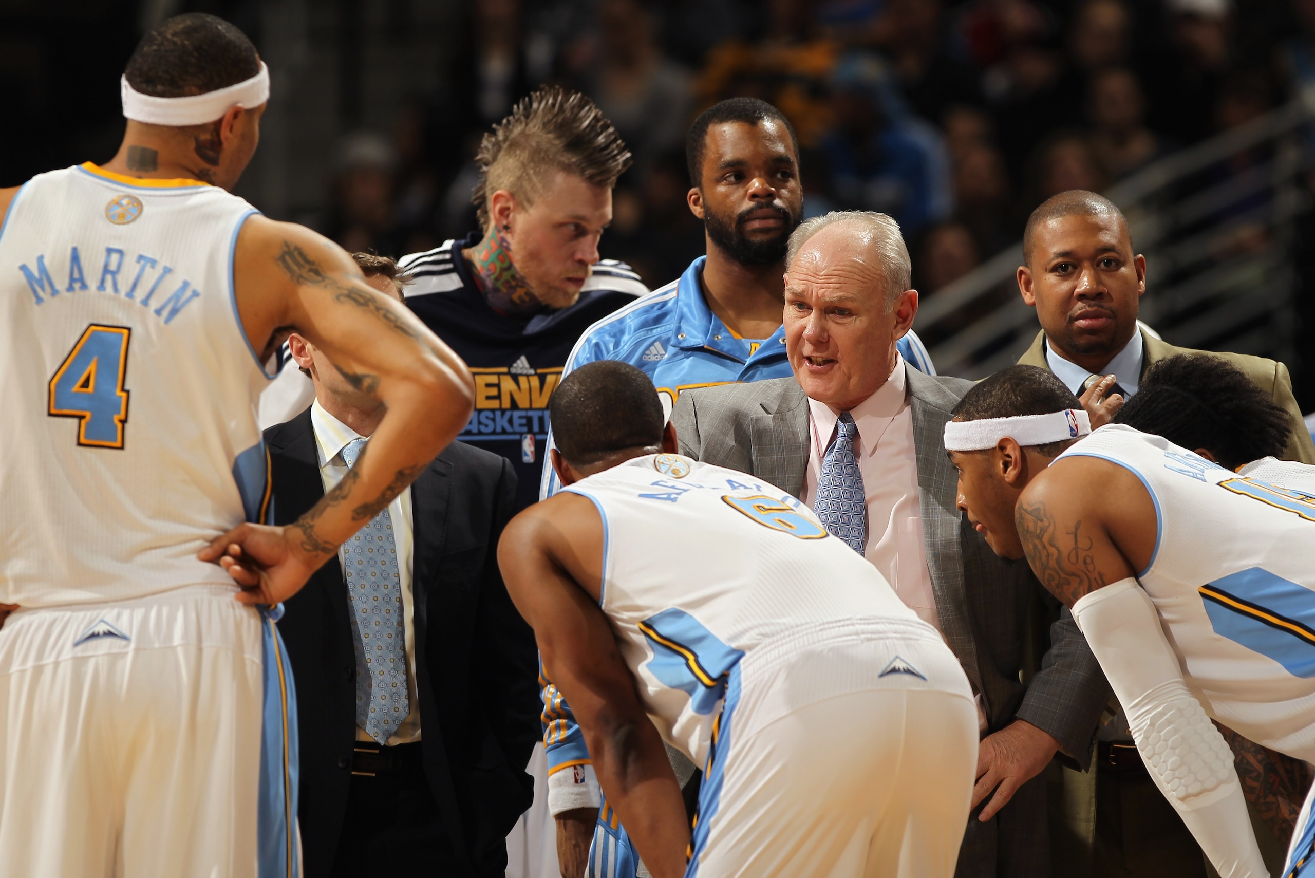 DENVER, CO - FEBRUARY 10:  Head coach George Karl of the Denver Nuggets directs his team during a time out against the Dallas Mavericks during NBA action at the Pepsi Center on February 10, 2011 in Denver, Colorado. The Nuggets defeated the Mavericks 121-