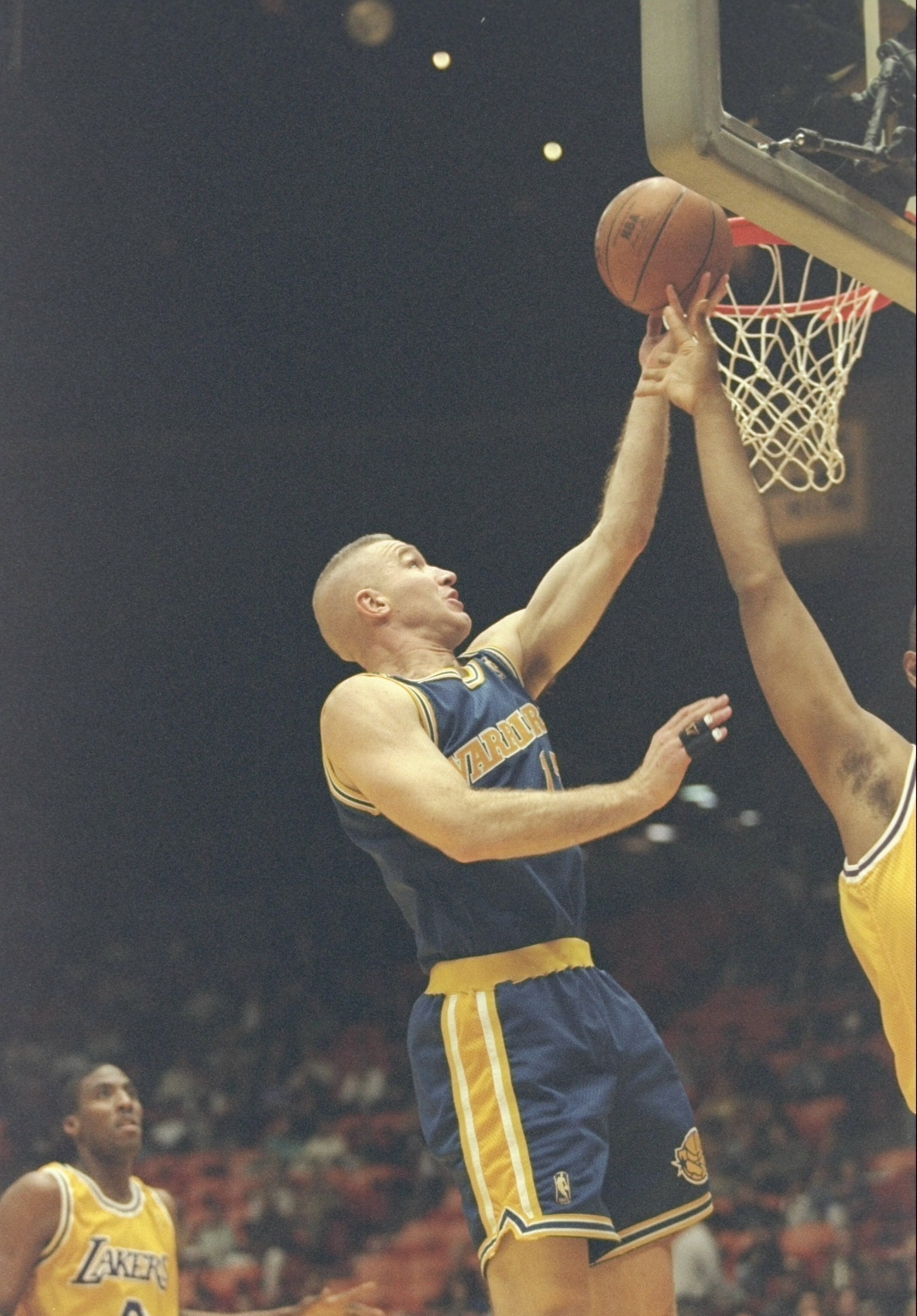 24 Jan 1997:  Forward Chris Mullin of the Golden State Warriors lays up the ball during a game against the Los Angeles Lakers at the Great Western Forum in Inglewood, California.  The Lakers won the game 114-97.   Mandatory Credit: Jed Jacobsohn  /Allspor