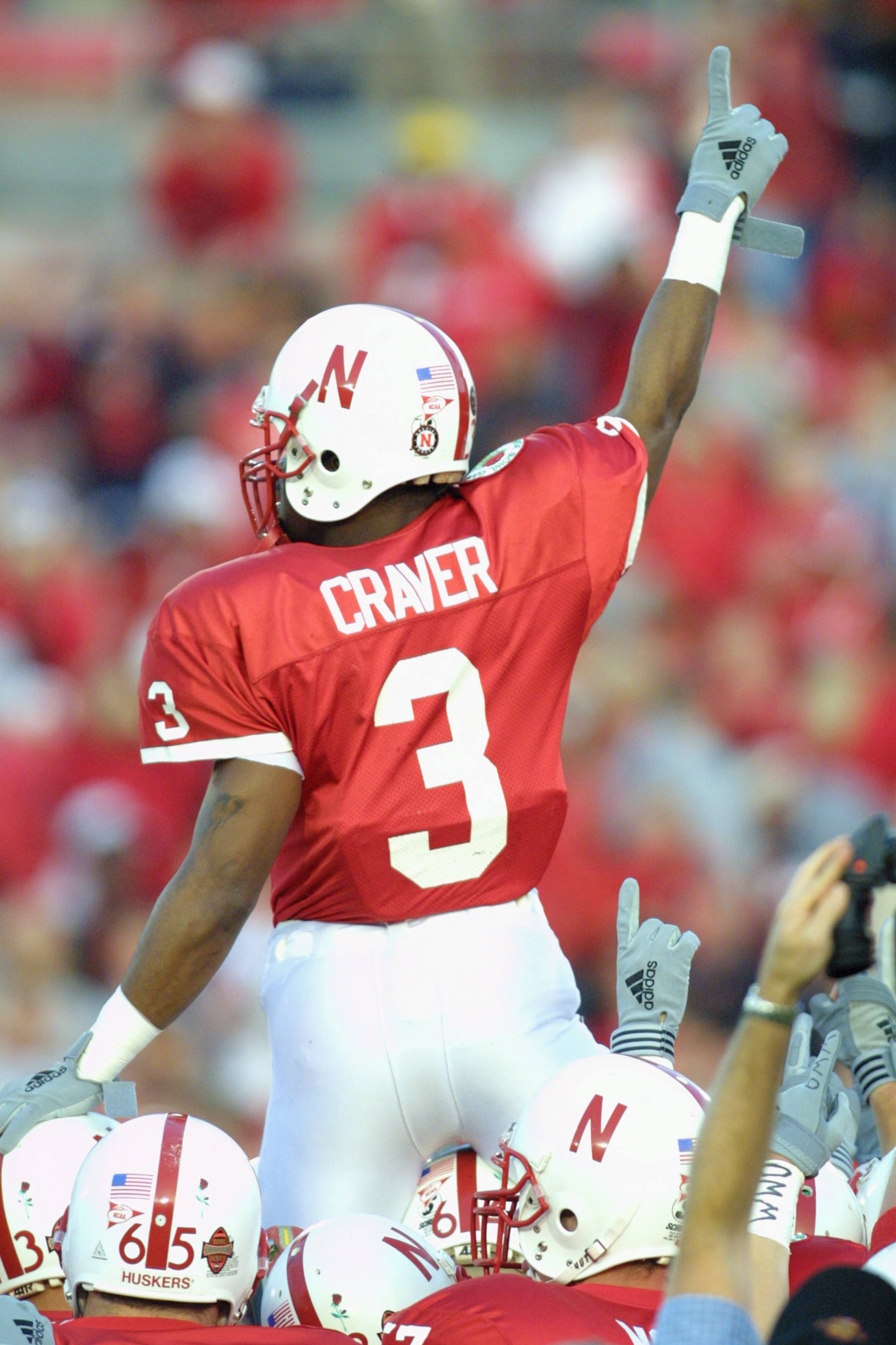 3 Jan 2002:    The Nebraska Cornhuskers lift up Keyuo Craver #3 prior to the Rose Bowl National Championship Game versus Miami at the Rose Bowl in Pasadena, California.  Miami won 37-14.  DIGITAL IMAGE    Mandatory Credit:  Stephen Dunn/Getty Images