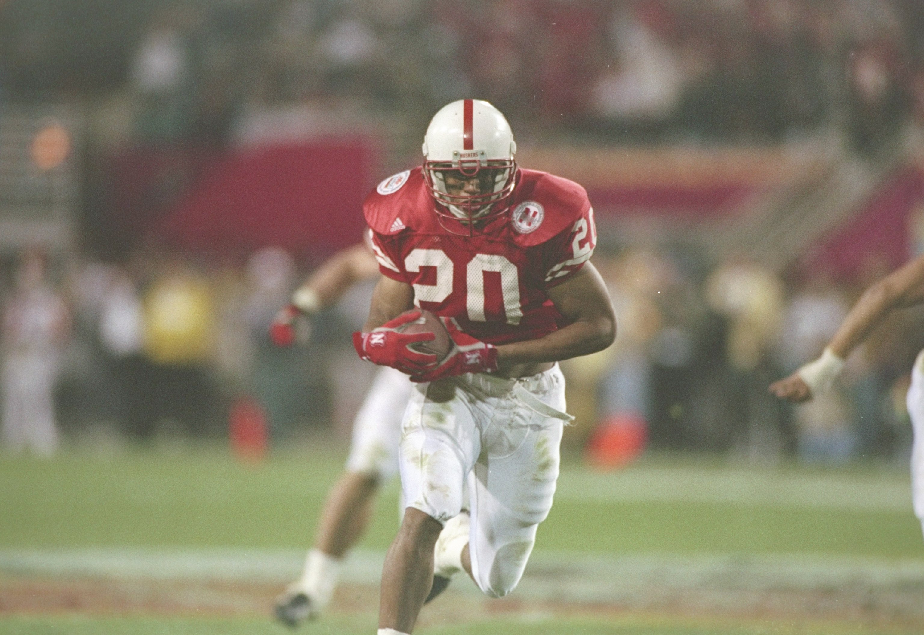 19 Oct 1996:  This is an action picture of defensive back Michael Booker of the Nebraska Cornhuskers during a game against the Florida Gators at the Fiesta Bowl in Tempe, Arizona.  Nebraska won 62-24. Mandatory Credit: Stephen Dunn  /Allsport