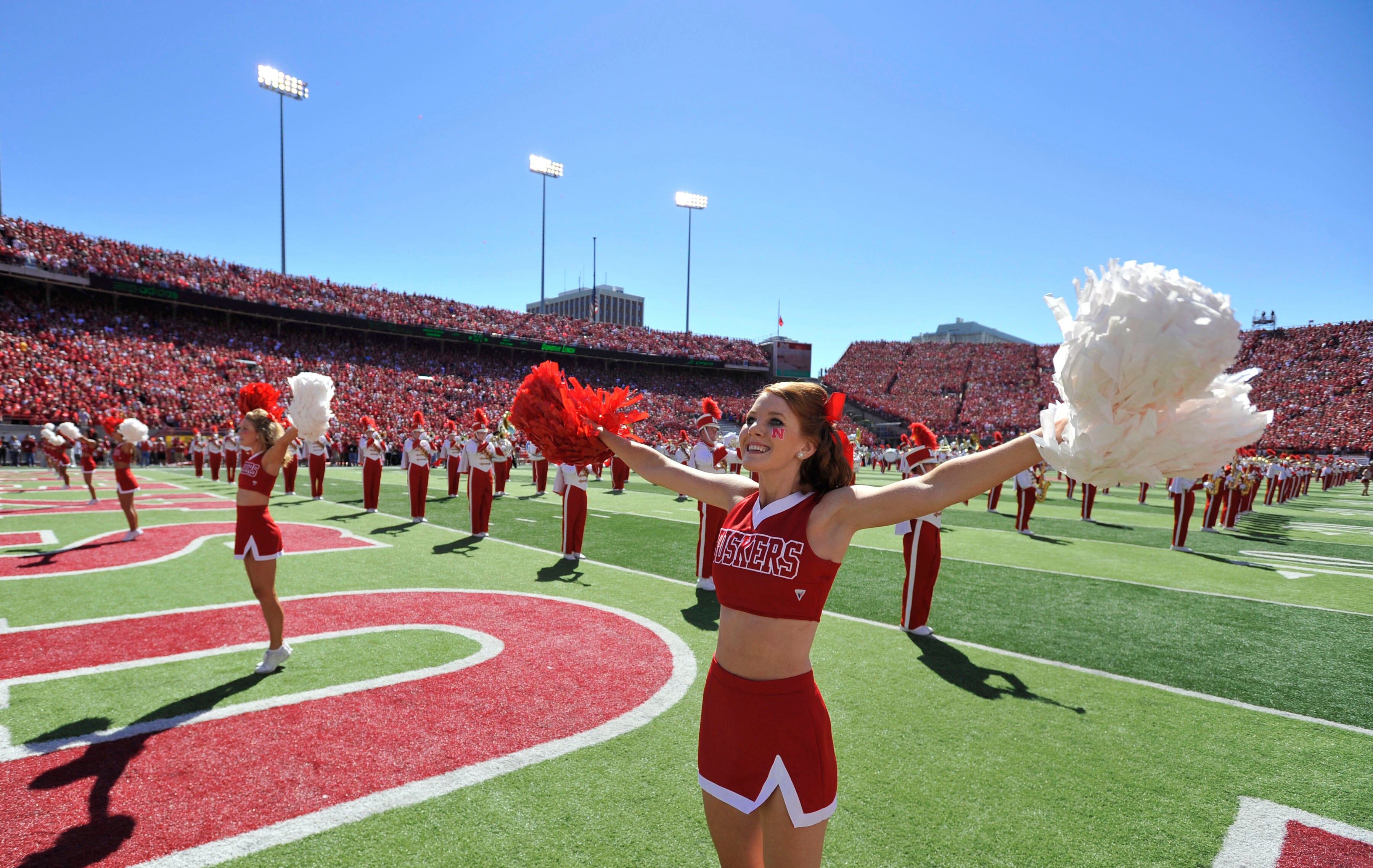 LINCOLN, NEBRASKA - SEPTEMBER 11: The Nebraska Cornhuskers cheerleaders warm up the crowd before the game between between the Nebraska Cornhuskers and the Idaho Vandals at Memorial Stadium on September 4, 2010 in Lincoln, Nebraska. Nebraska defeated Idaho