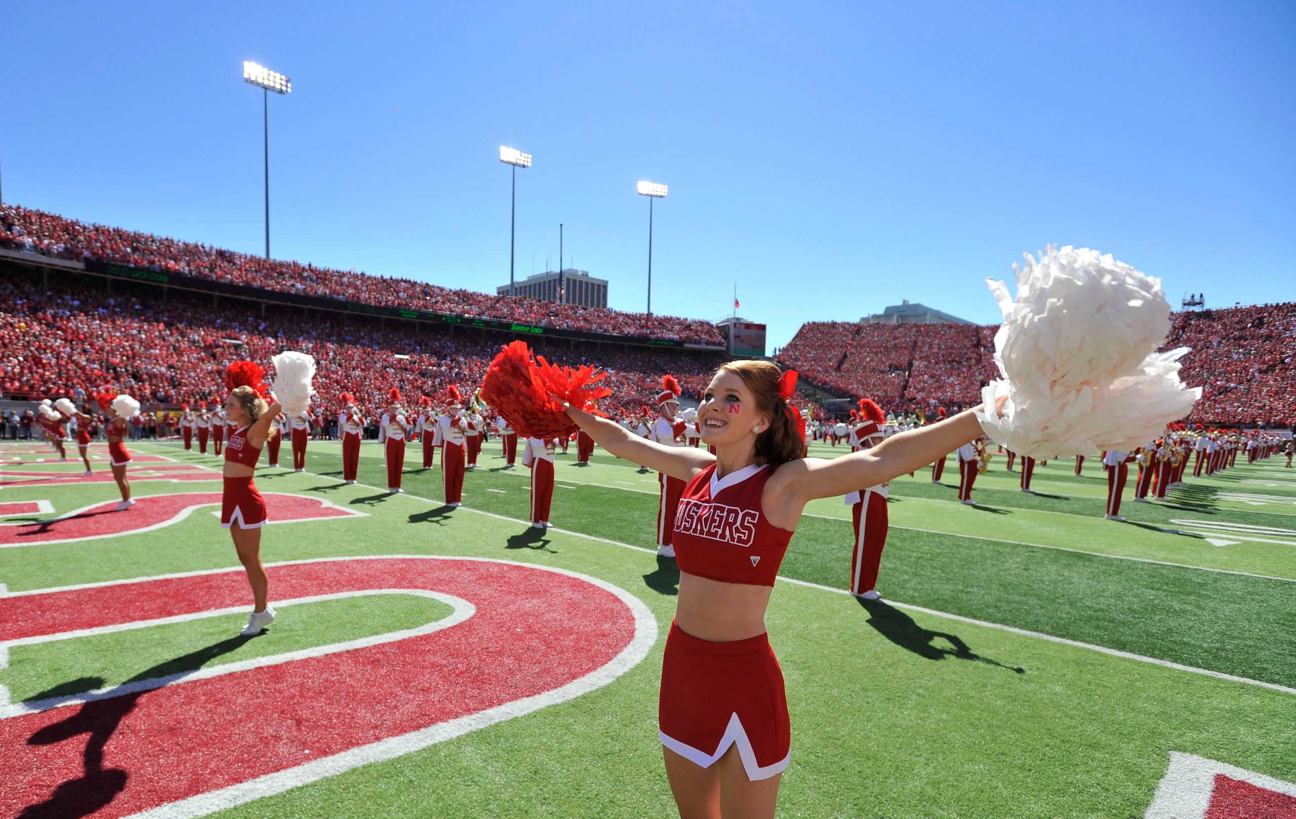 LINCOLN, NEBRASKA - SEPTEMBER 11: The Nebraska Cornhuskers cheerleaders warm up the crowd before the game between between the Nebraska Cornhuskers and the Idaho Vandals at Memorial Stadium on September 4, 2010 in Lincoln, Nebraska. Nebraska defeated Idaho