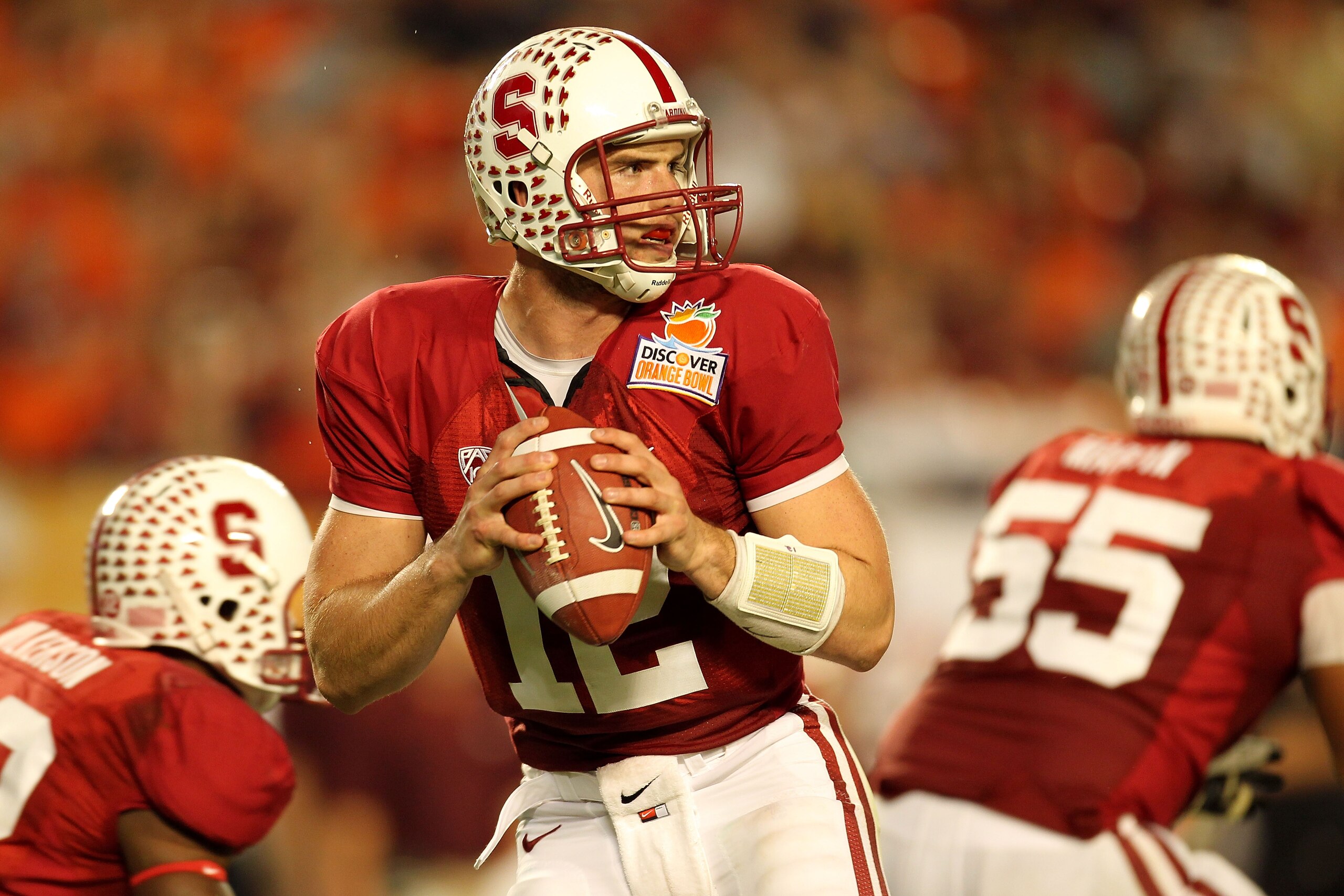 MIAMI, FL - JANUARY 03: Andrew Luck #12 of the Stanford Cardinal drops back to pass against the Virginia Tech Hokies during the 2011 Discover Orange Bowl at Sun Life Stadium on January 3, 2011 in Miami, Florida. (Photo by Mike Ehrmann/Getty Images)