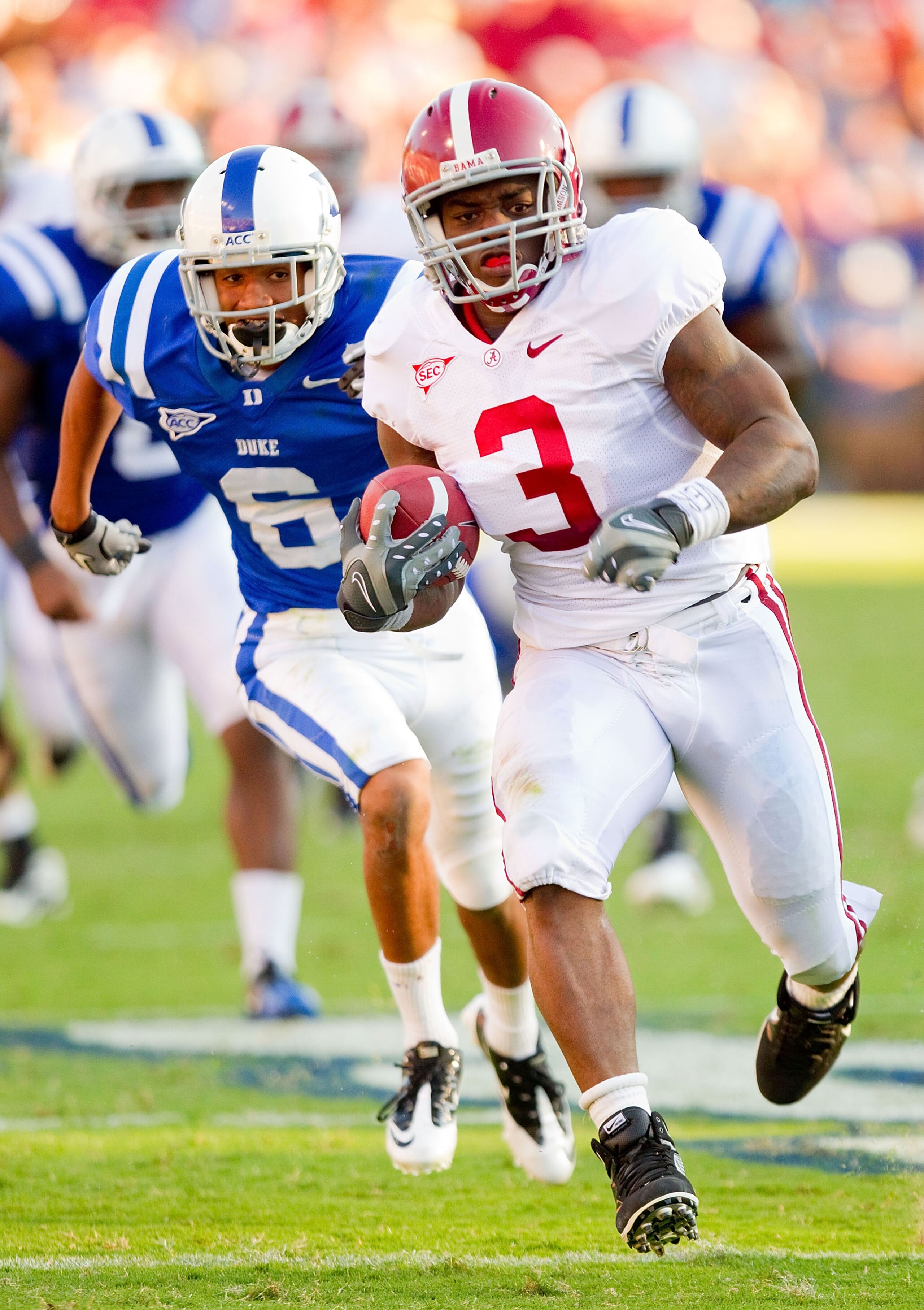 DURHAM, NC - SEPTEMBER 18: Trent Richardson #3 of the Alabama Crimson Tide breaks away from Ross Cockrell #6 of the Duke Blue Devils for a 45-yard touchdown run at Wallace Wade Stadium on September 18, 2010 in Durham, North Carolina.  The Crimson Tide def
