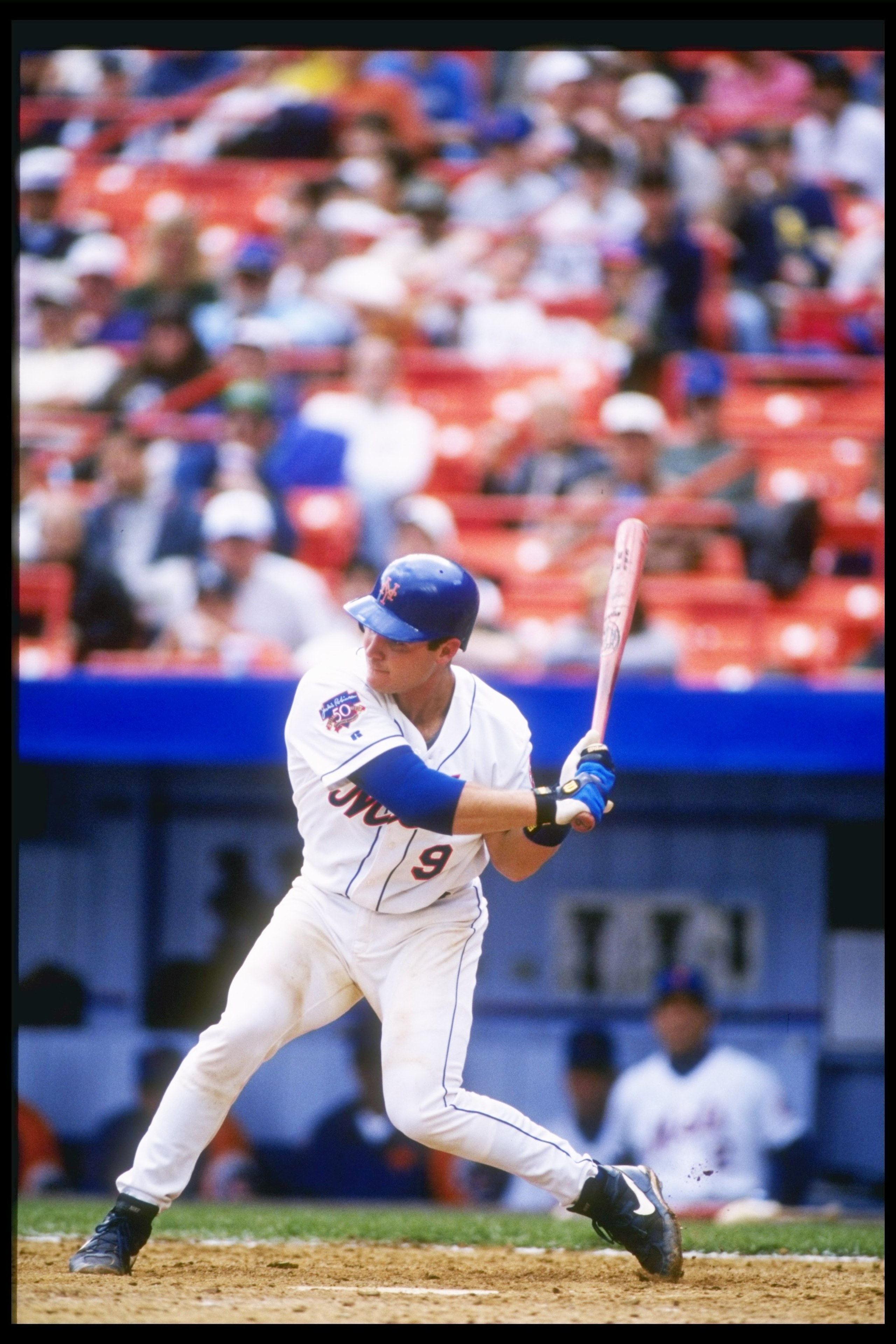 13 Apr 1997: Catcher Todd Hundley of the New York Mets swings at the ball during a game against the San Francisco Giants at Shea Stadium in Flushing, New York. The Giants won the game 5-1. 13 Apr 1997: Catcher Todd Hundley of the New York Mets swings at the ball during a game against the San Francisco Giants at Shea Stadium in Flushing, New York. The Giants won the game 5-1.