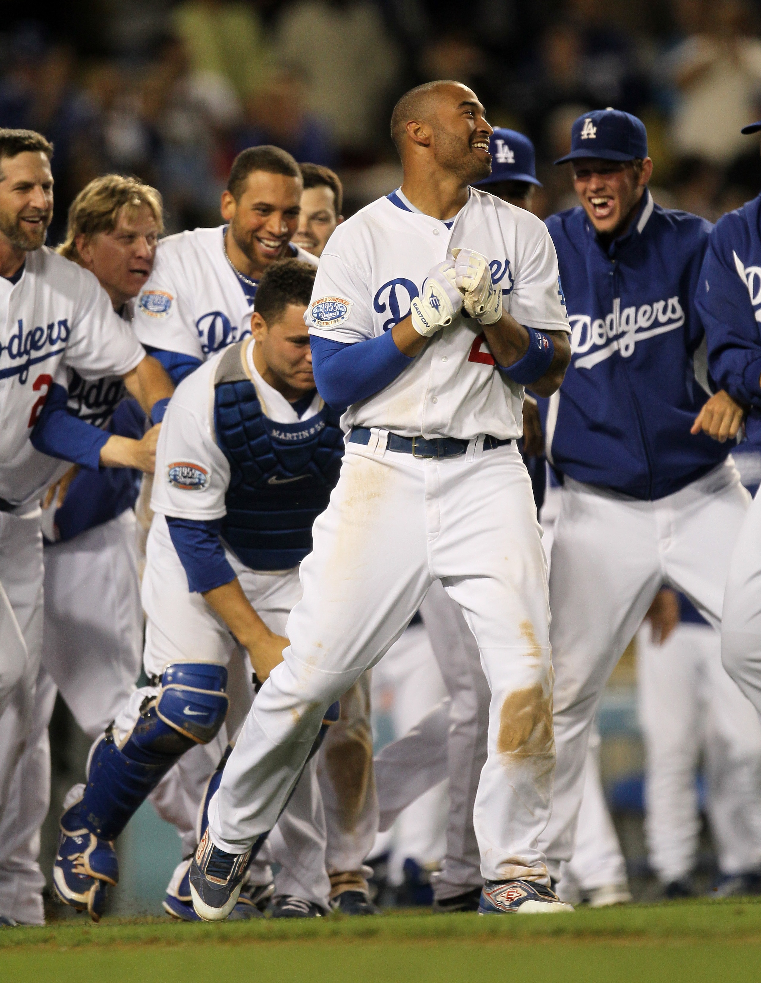 LOS ANGELES, CA - JUNE 01: Matt Kemp #27 of the Los Angeles Dodgers celebrates with teammates at home plate after hitting a walk off home run in the tenth inning against the Arizona Diamondbacks on June 1, 2010 at Dodger Stadium in Los Angeles, Californi LOS ANGELES, CA - JUNE 01: Matt Kemp #27 of the Los Angeles Dodgers celebrates with teammates at home plate after hitting a walk off home run in the tenth inning against the Arizona Diamondbacks on June 1, 2010 at Dodger Stadium in Los Angeles, Californi