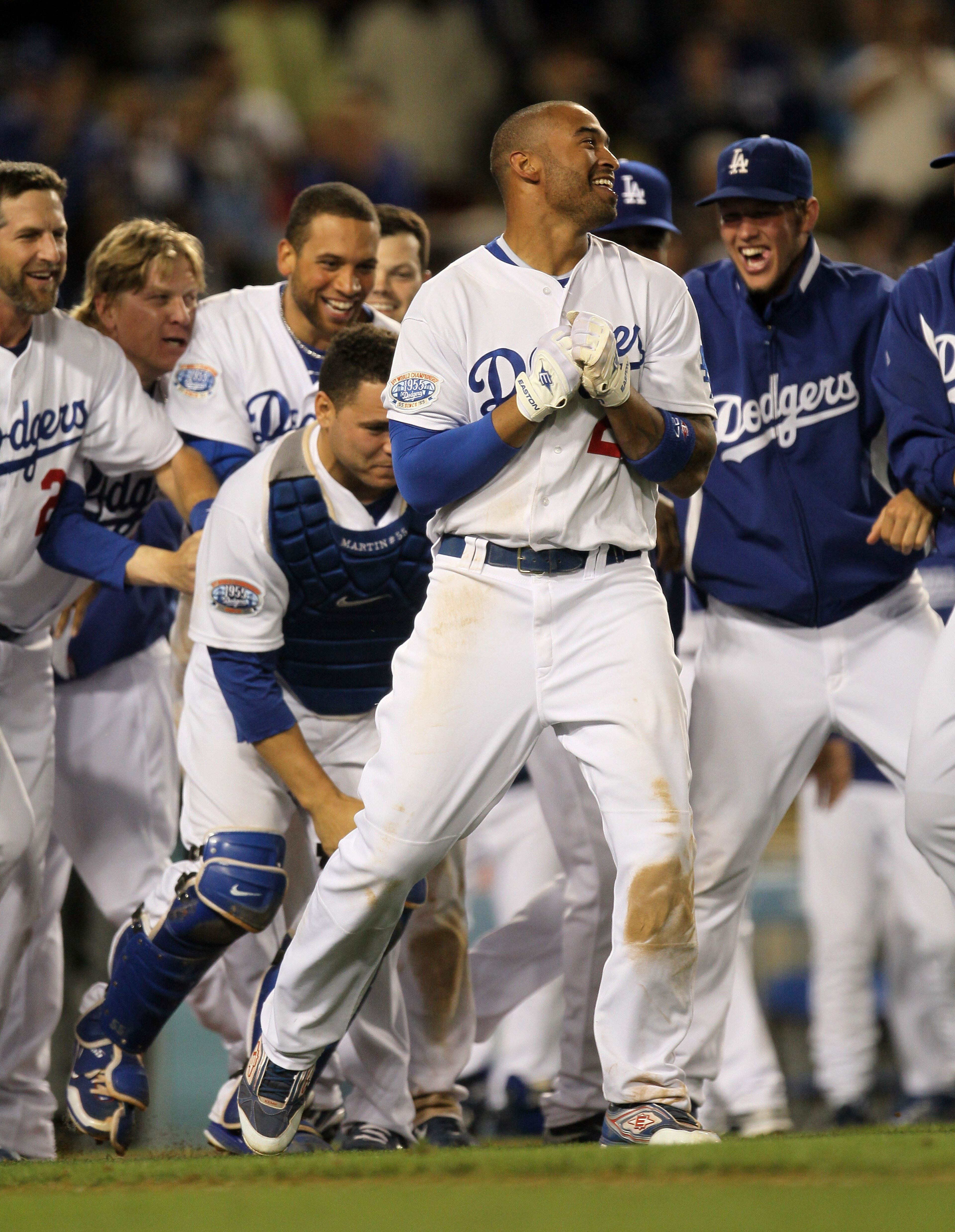 LOS ANGELES, CA - JUNE 01:  Matt Kemp #27 of the Los Angeles Dodgers celebrates with teammates at home plate after hitting a walk off home run in the tenth inning against the Arizona Diamondbacks on June 1, 2010 at Dodger Stadium in Los Angeles, Californi